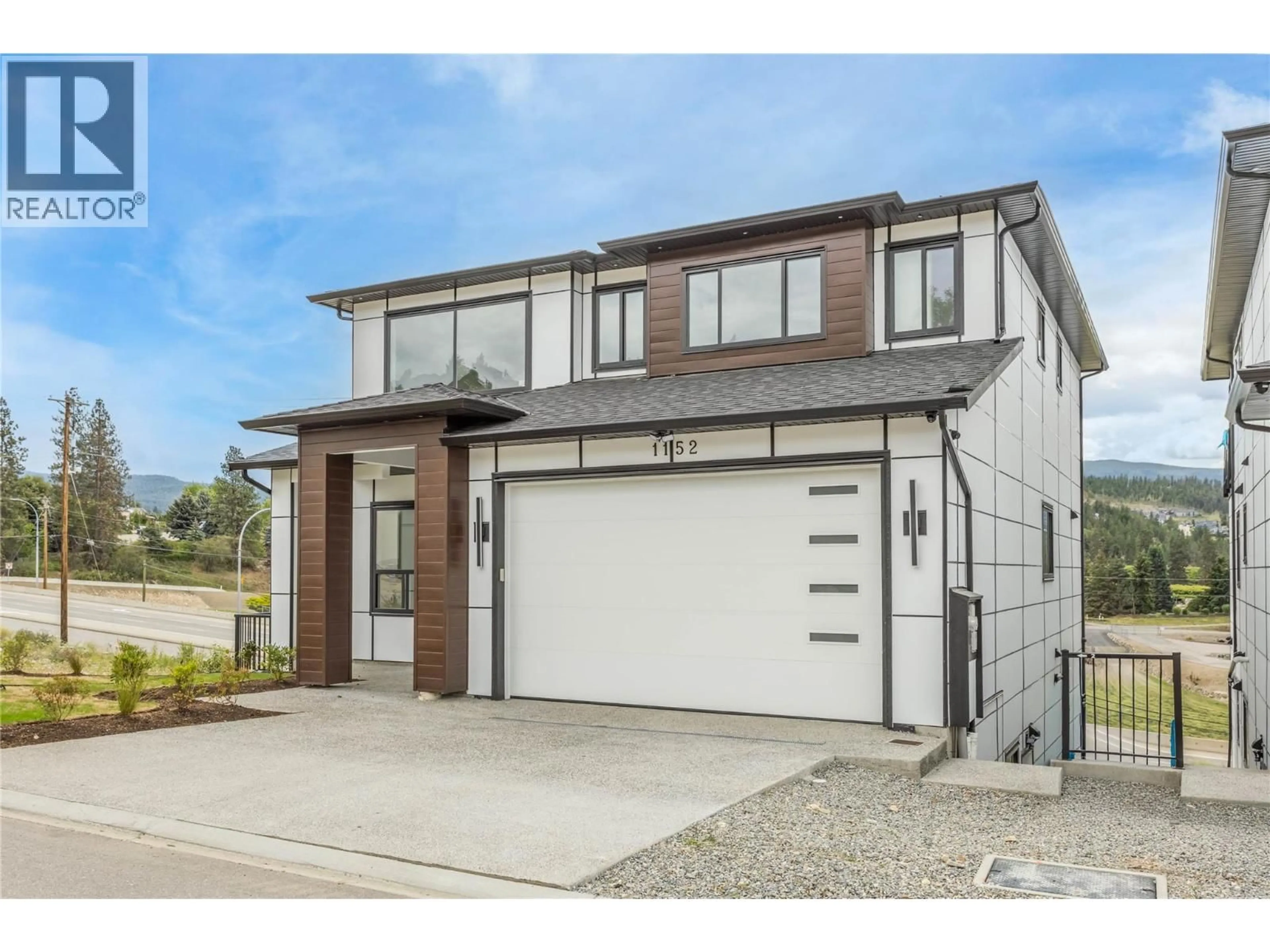 Home with brick exterior material, street for 1152 HUME AVENUE, Kelowna British Columbia V1P0A9