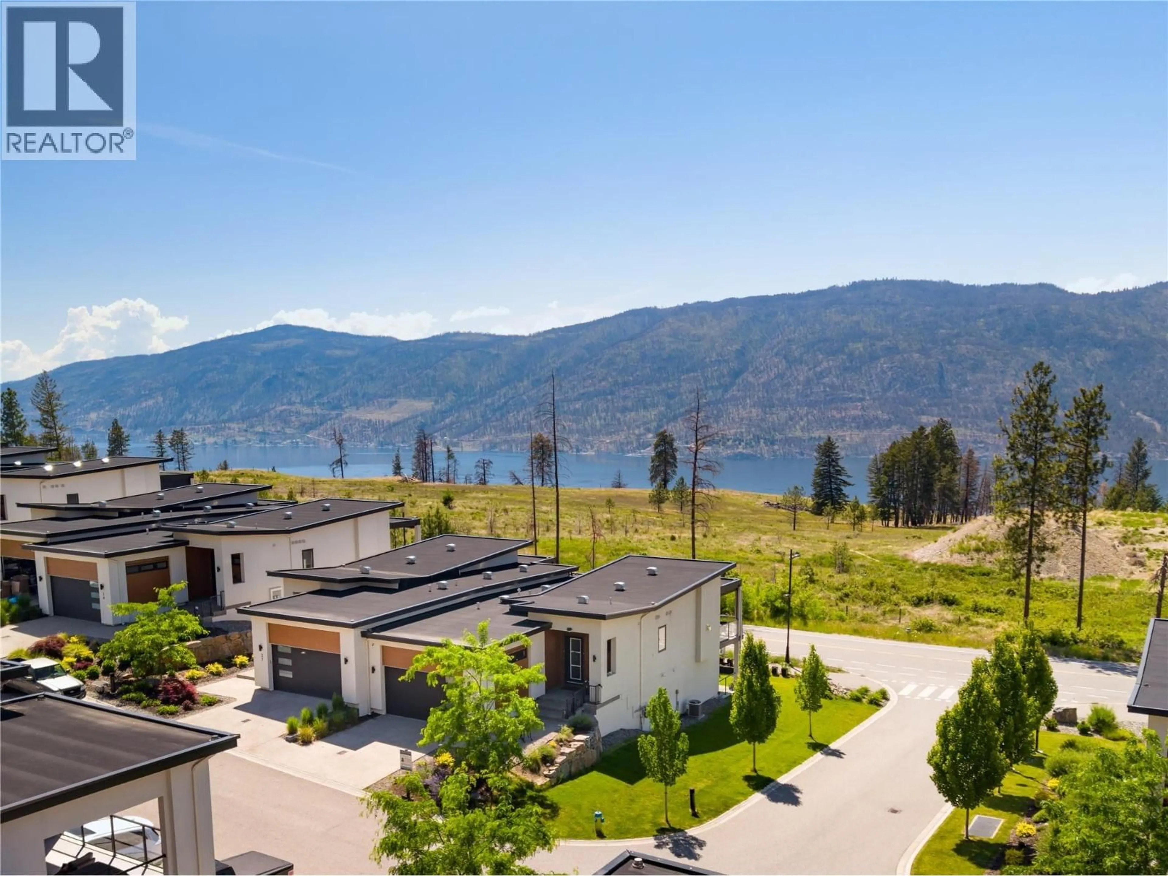 A pic from outside/outdoor area/front of a property/back of a property/a pic from drone, mountain view for 28 - 10100 TYNDALL ROAD, Lake Country British Columbia V4V0A9