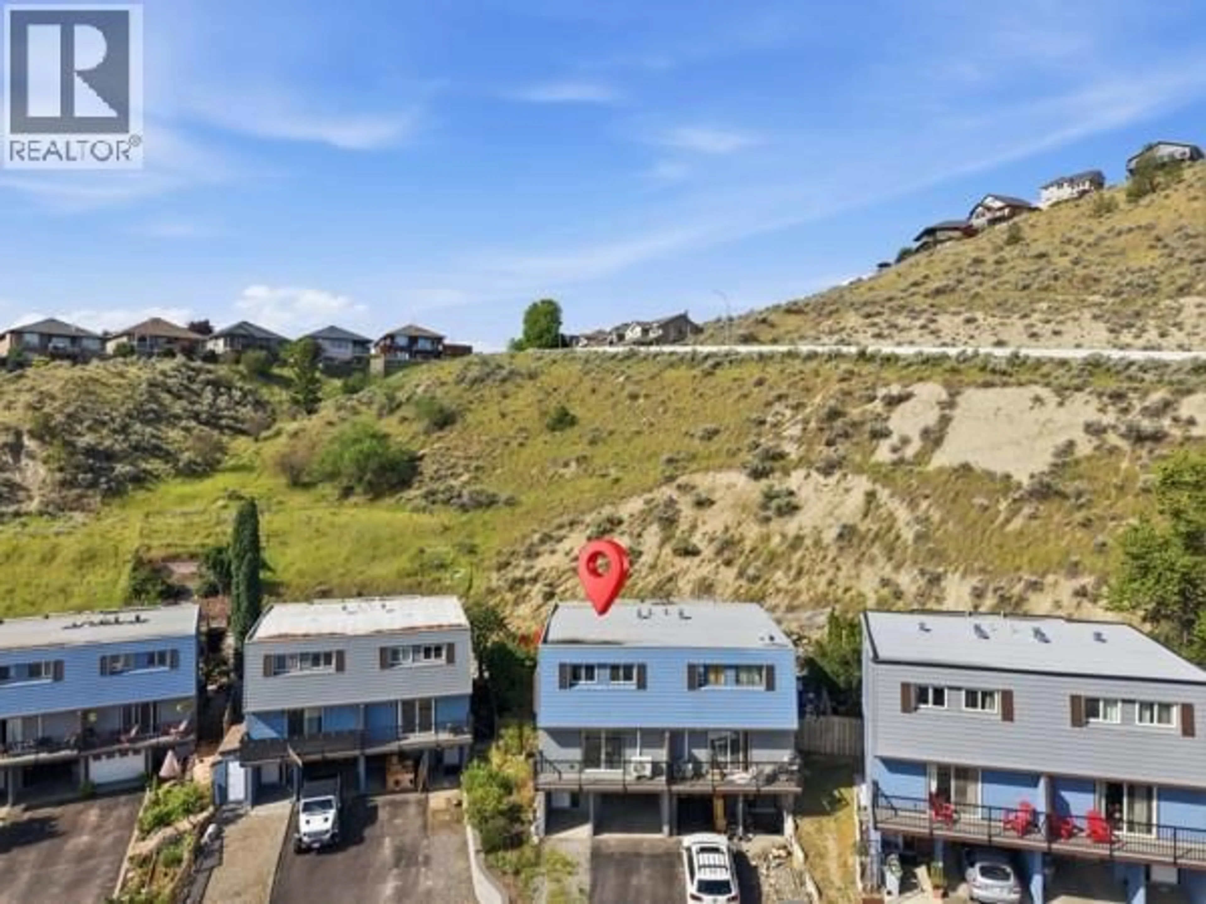 A pic from outside/outdoor area/front of a property/back of a property/a pic from drone, mountain view for 873 MCQUEEN DRIVE, Kamloops British Columbia V2B7X8