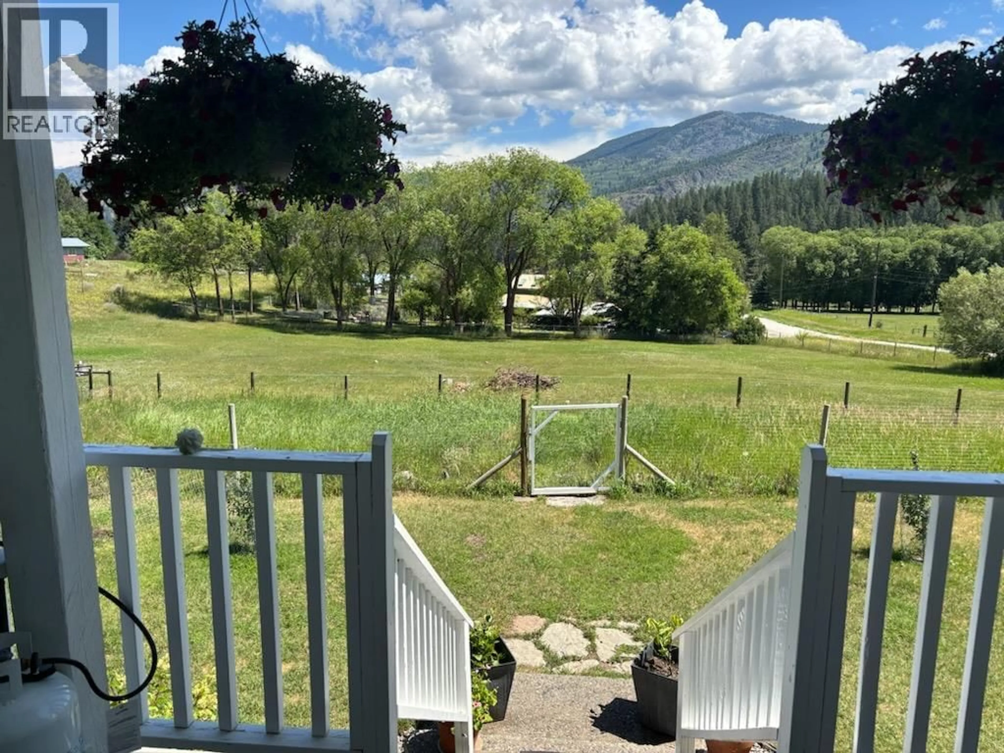 A pic from outside/outdoor area/front of a property/back of a property/a pic from drone, mountain view for 3195 HAIRSINE ROAD, Grand Forks British Columbia V0H1H2