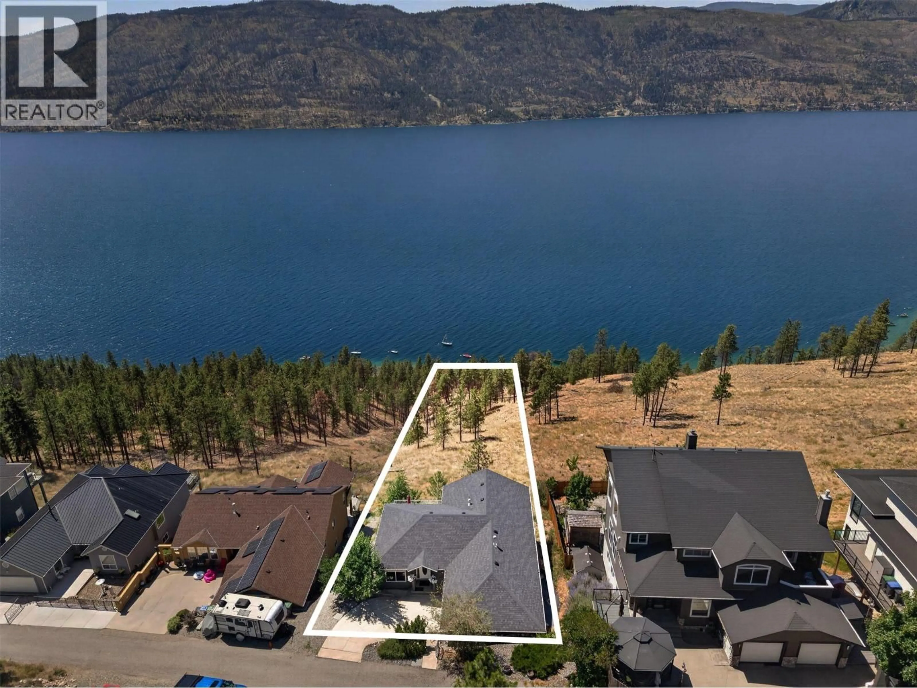 A pic from outside/outdoor area/front of a property/back of a property/a pic from drone, water/lake/river/ocean view for 10326 NIGHTHAWK ROAD, Lake Country British Columbia V4V2K7