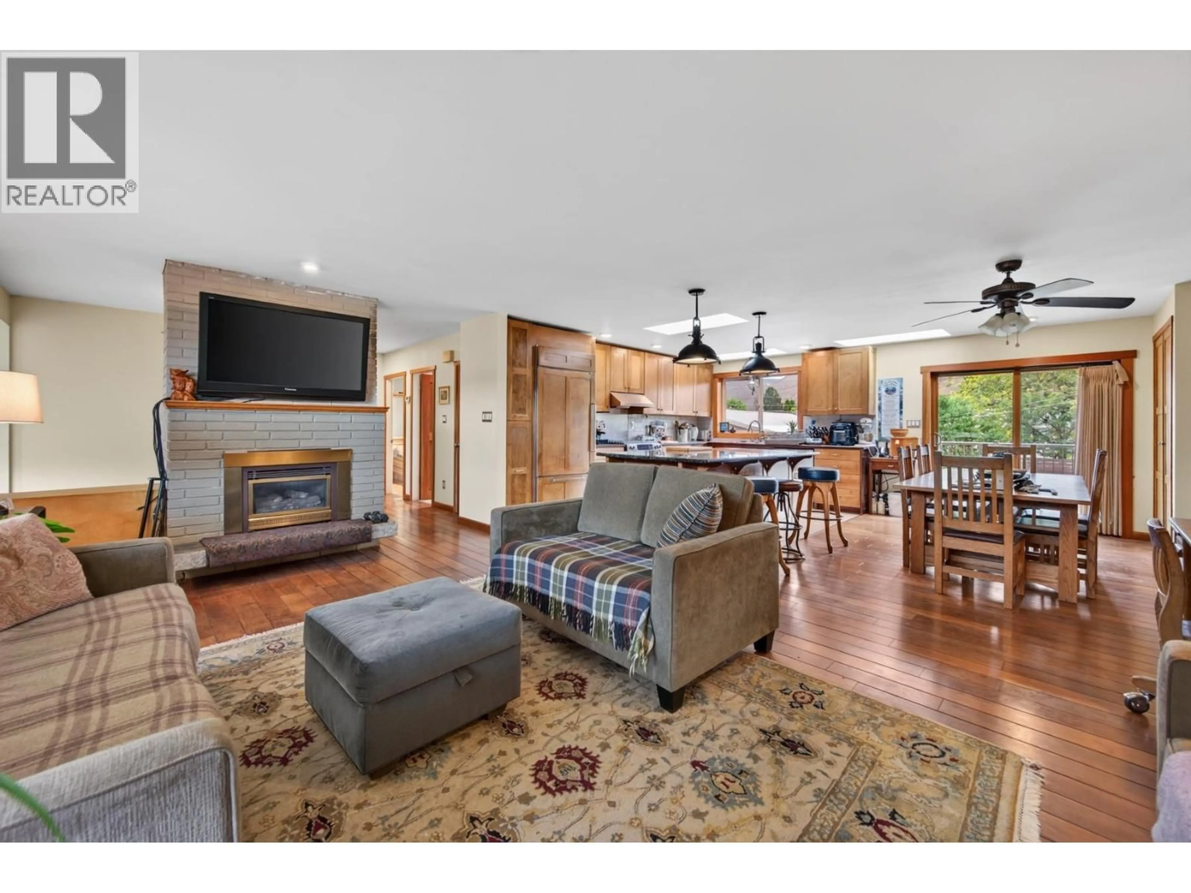 Open concept kitchen, wood/laminate floor for 2270 YOUNG AVENUE, Kamloops British Columbia V2B4M6