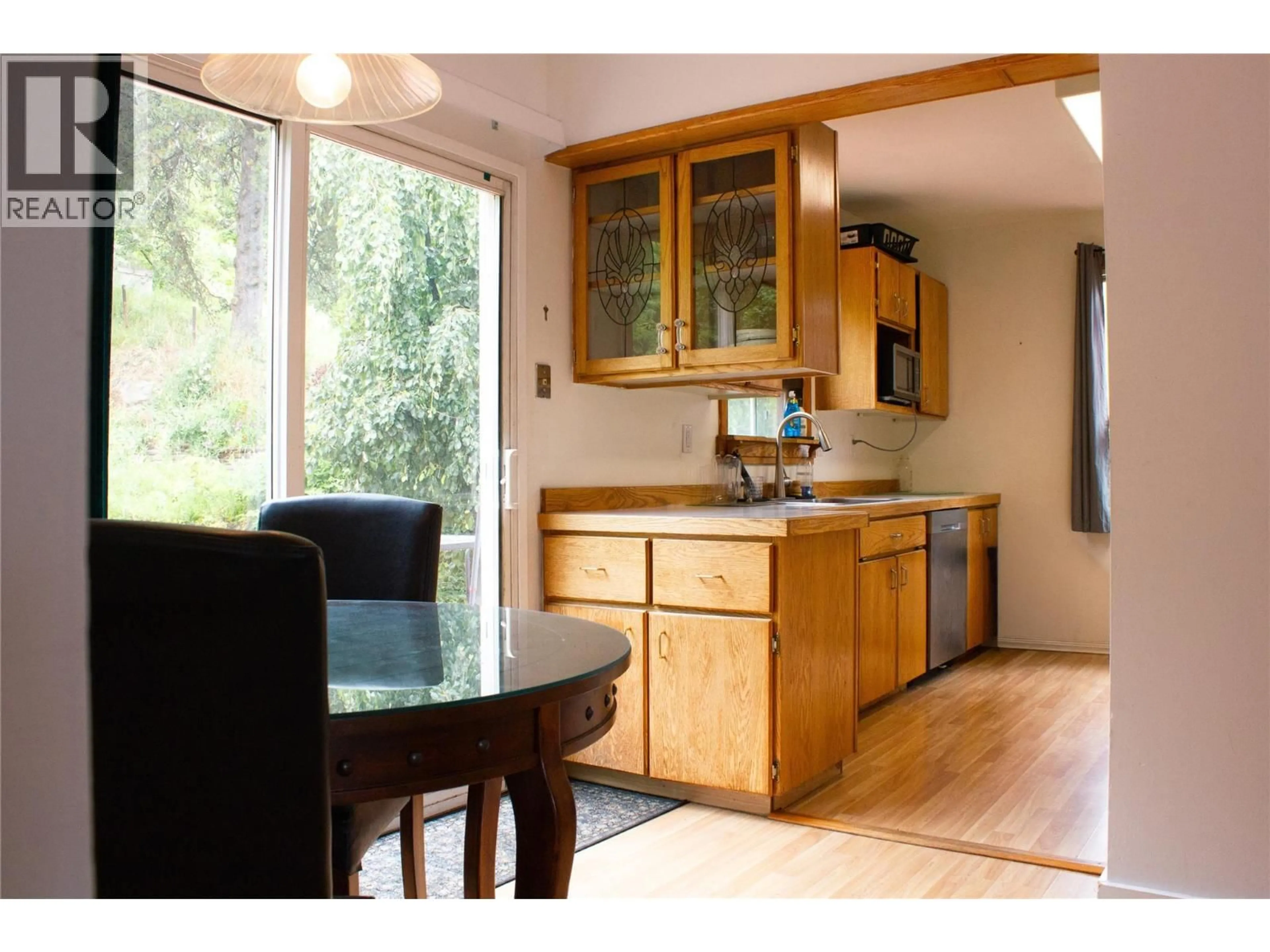 Open concept kitchen, wood/laminate floor for 2170 THOMPSON AVENUE, Rossland British Columbia V0G1Y0