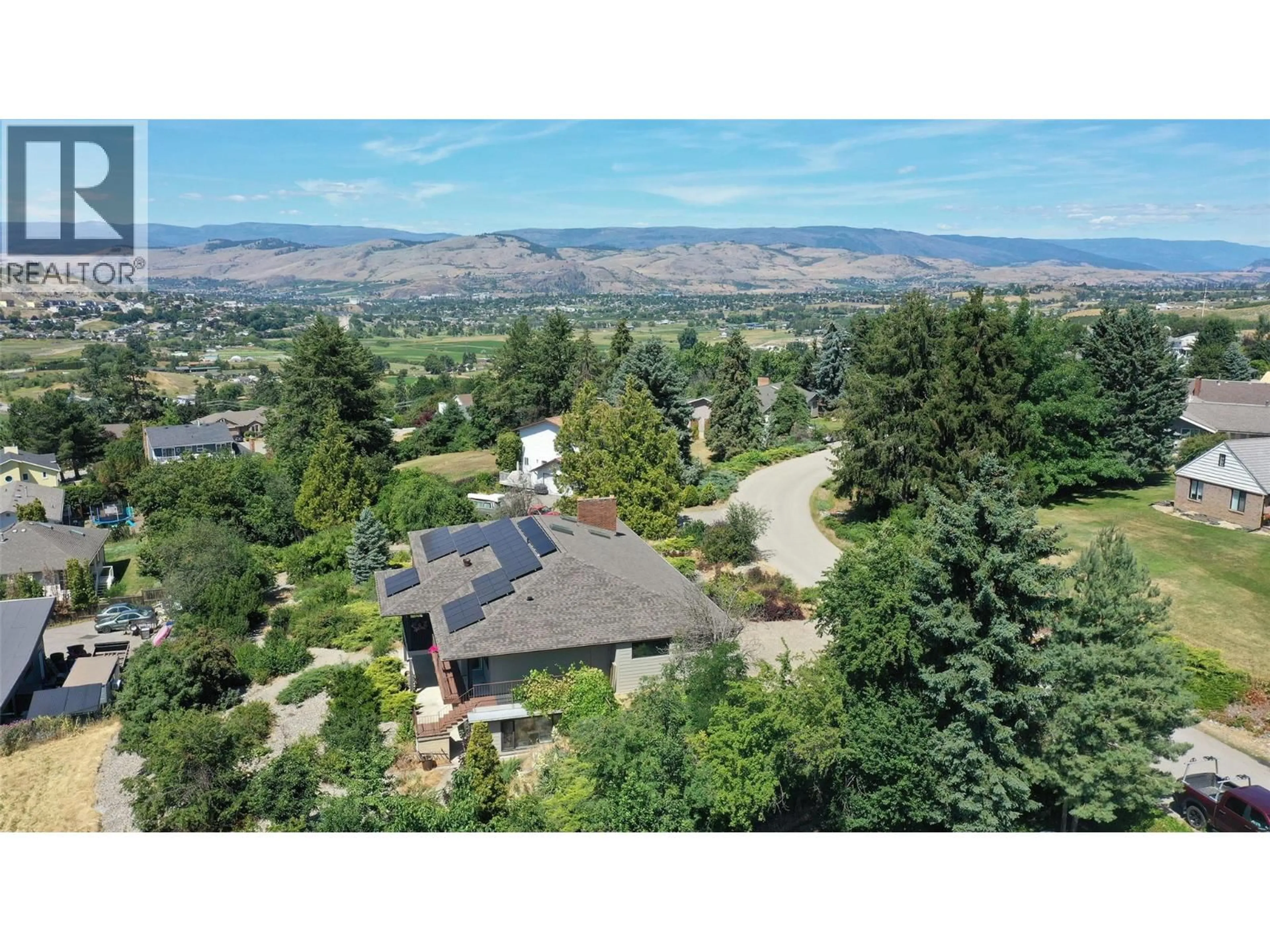 A pic from outside/outdoor area/front of a property/back of a property/a pic from drone, mountain view for 460 CRESTVIEW DRIVE, Coldstream British Columbia V1B2X6