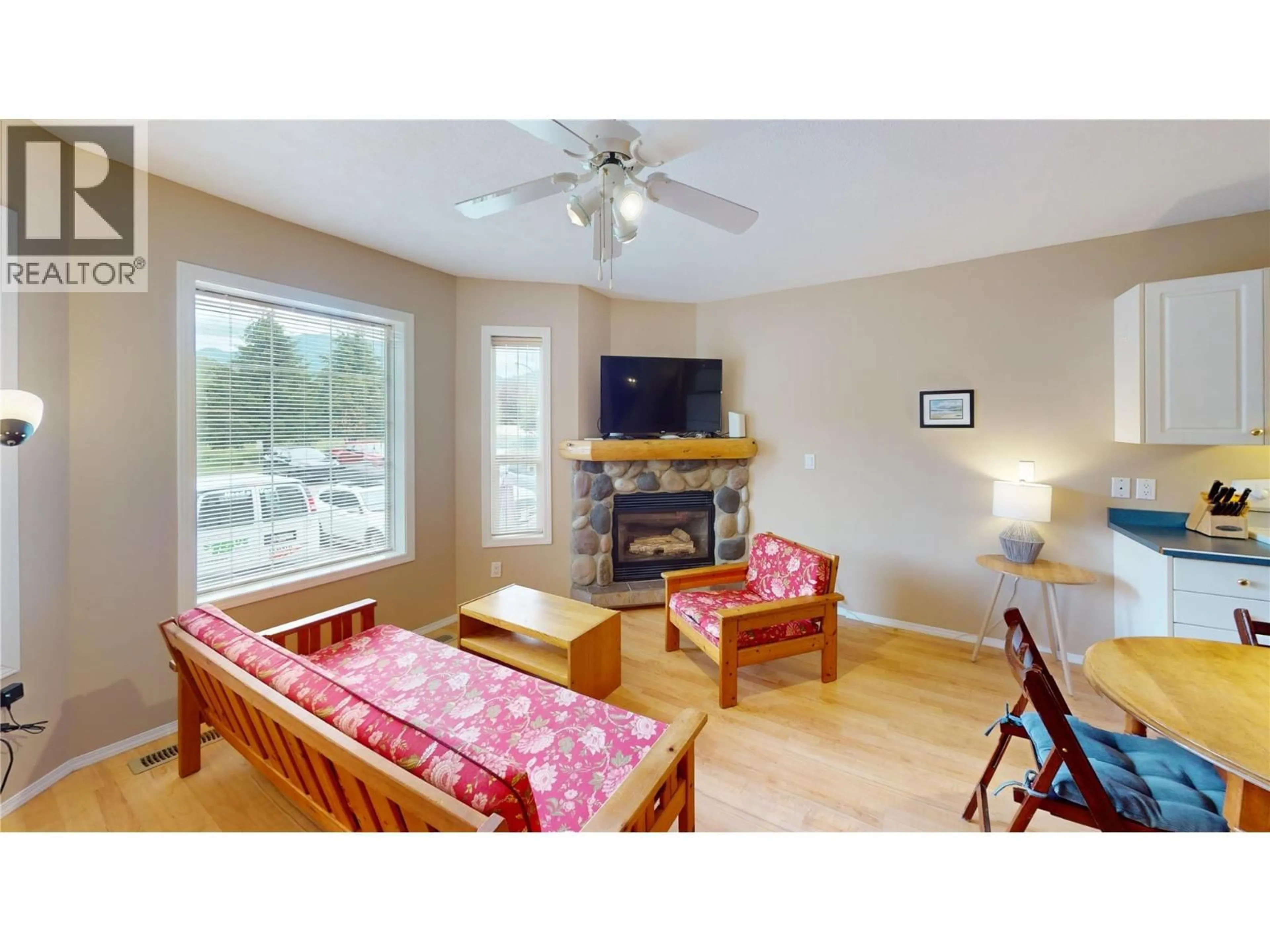 Living room with furniture, wood/laminate floor for 426 - 400 RIVERSIDE WAY, Fernie British Columbia V0B1M7
