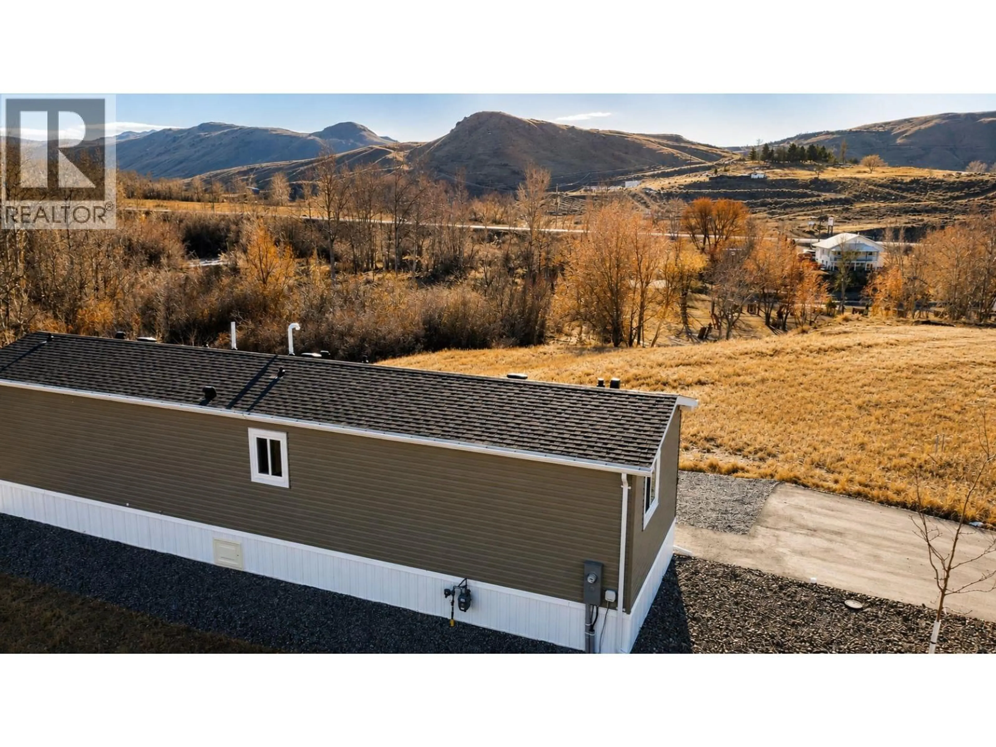 A pic from outside/outdoor area/front of a property/back of a property/a pic from drone, mountain view for 9 - 1620 STAGE ROAD, Cache Creek British Columbia V0K1H0