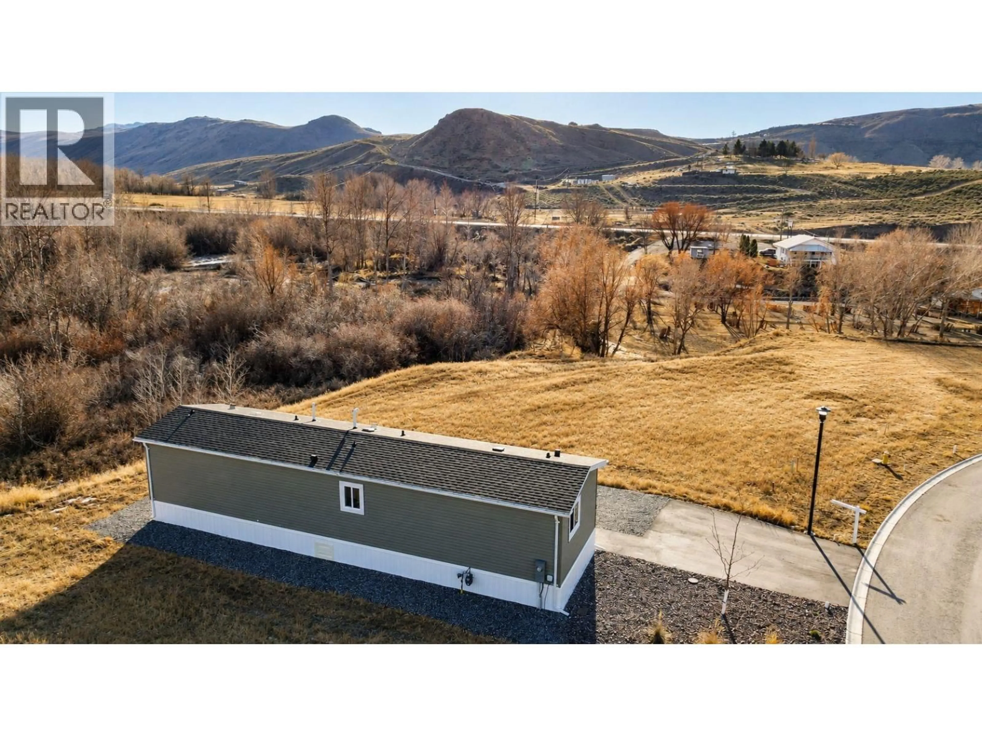 A pic from outside/outdoor area/front of a property/back of a property/a pic from drone, mountain view for 9 - 1620 STAGE ROAD, Cache Creek British Columbia V0K1H0
