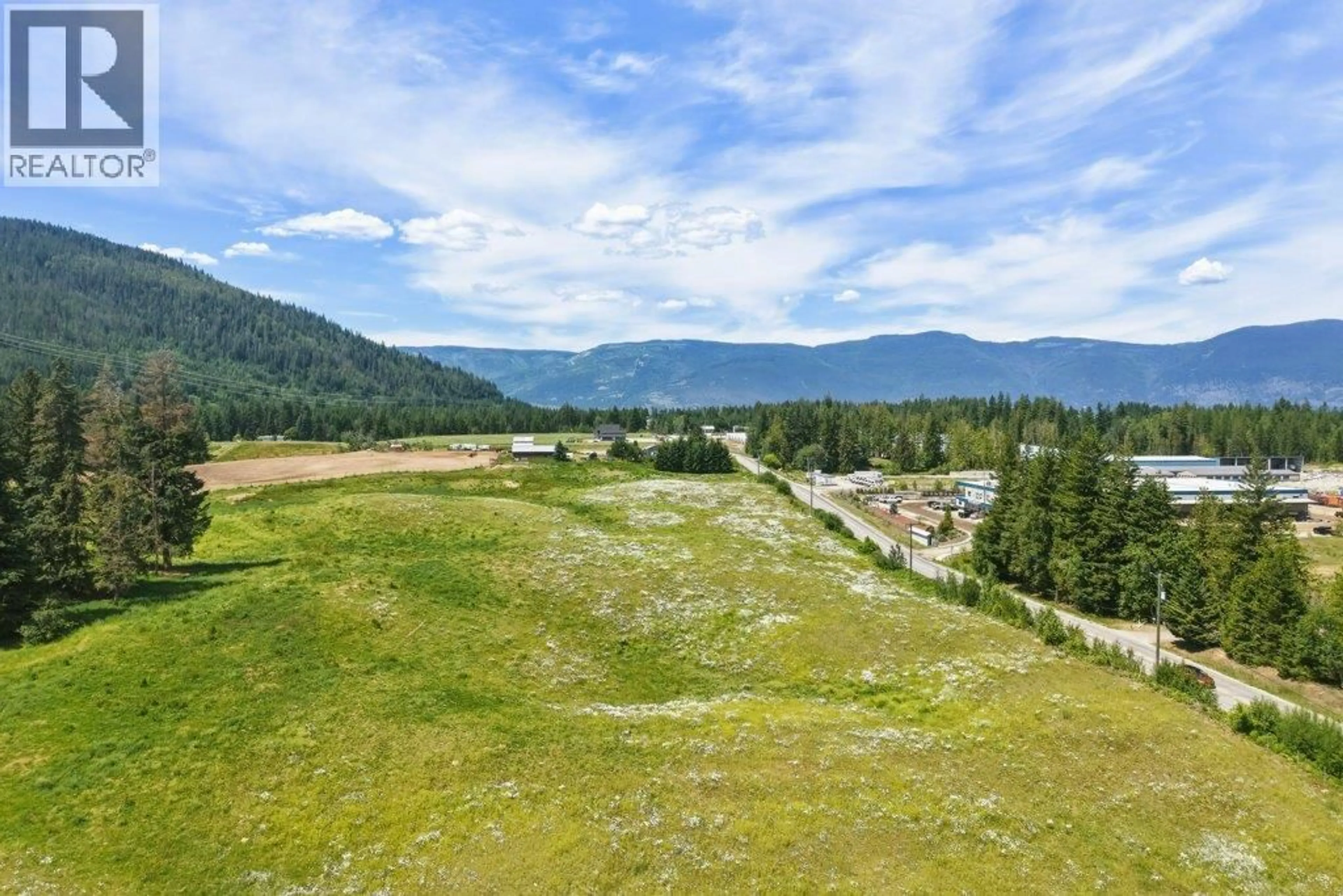 A pic from outside/outdoor area/front of a property/back of a property/a pic from drone, mountain view for 3580 20 AVENUE SOUTHEAST, Salmon Arm British Columbia V1E1X9