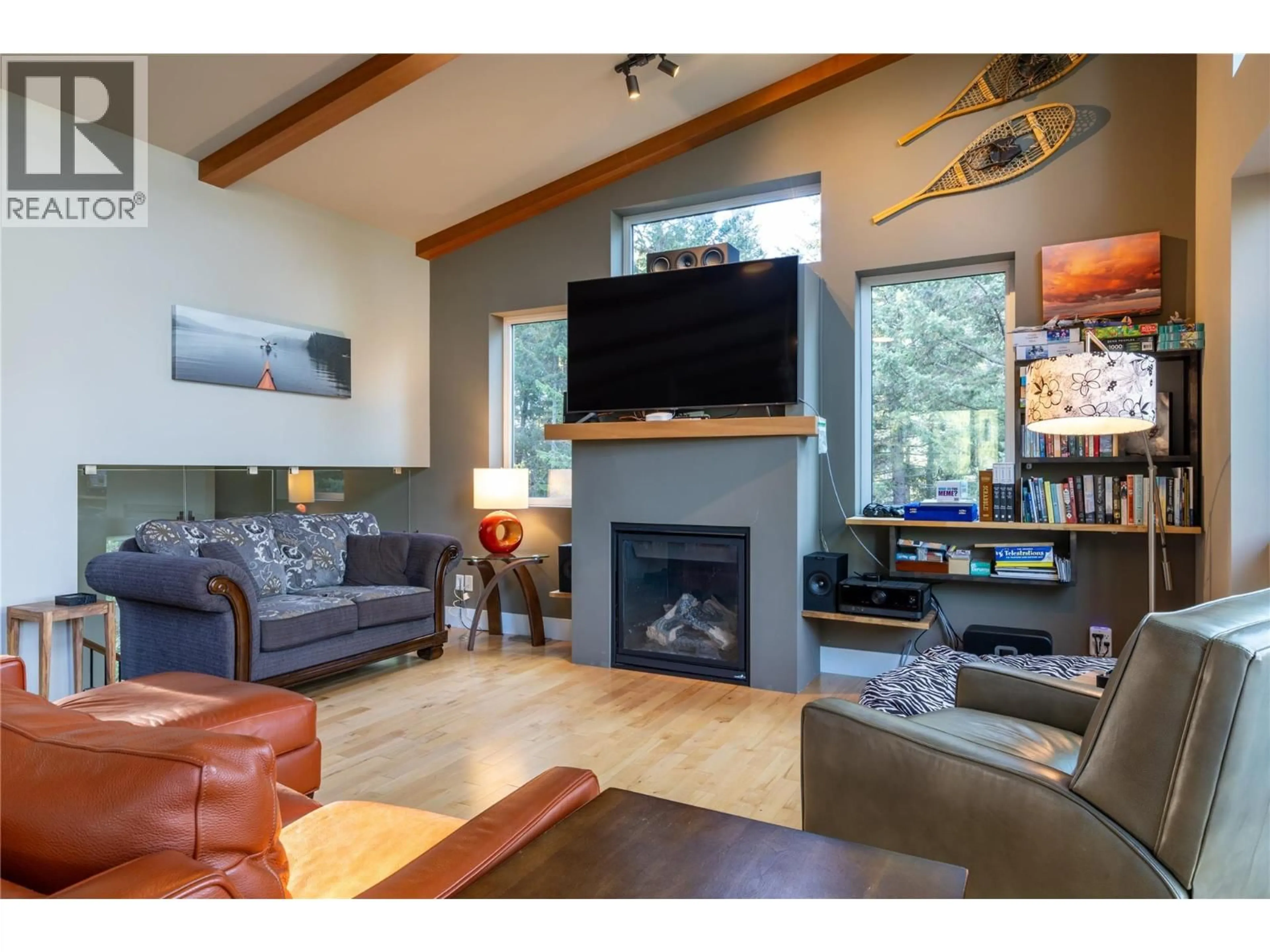 Living room with furniture, wood/laminate floor for 1541 QUARTZ CRESCENT, Golden British Columbia V0A1H3