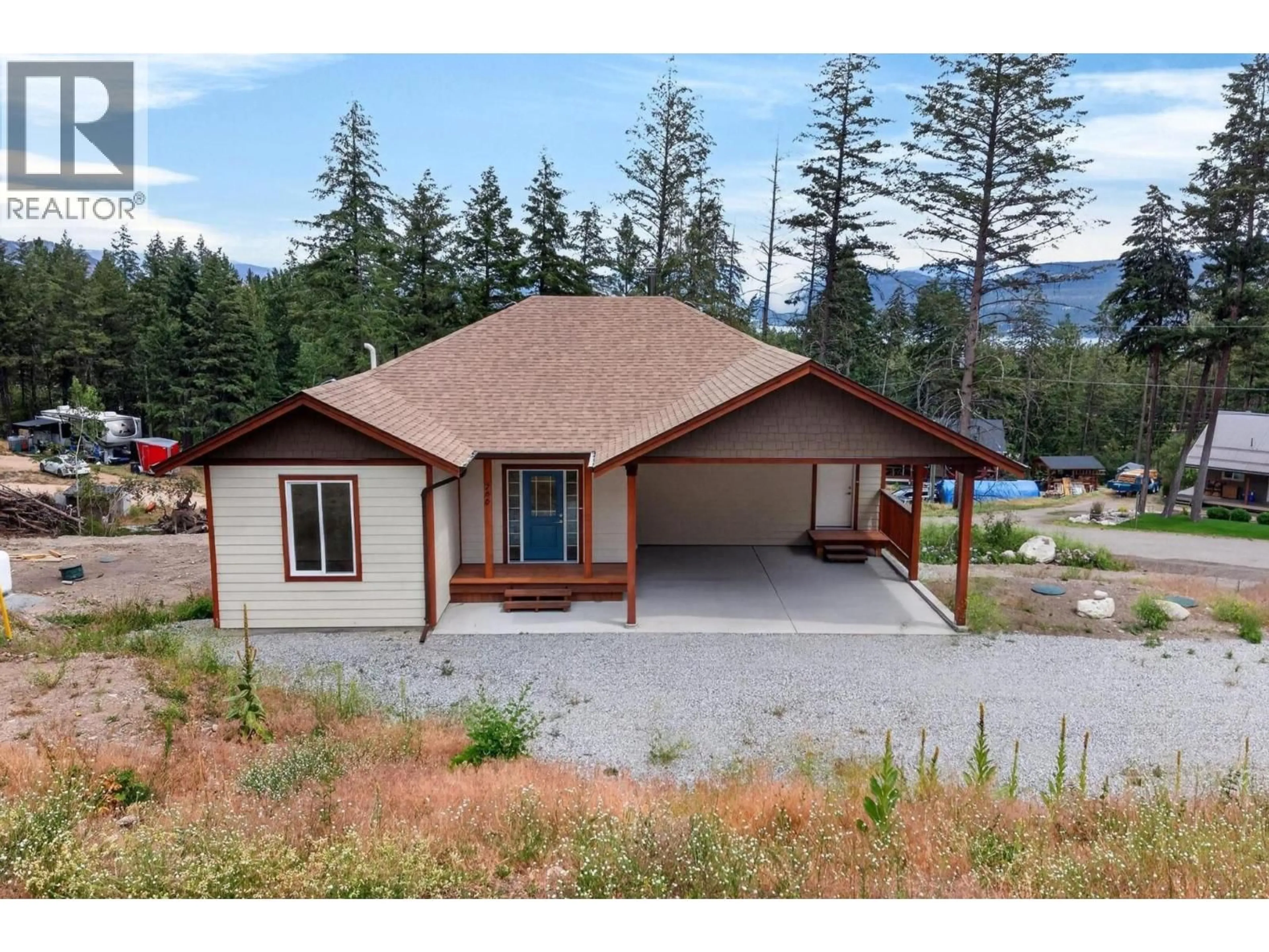 A pic from outside/outdoor area/front of a property/back of a property/a pic from drone, mountain view for 766 BALSAM ROAD, Kelowna British Columbia V1Z3V8