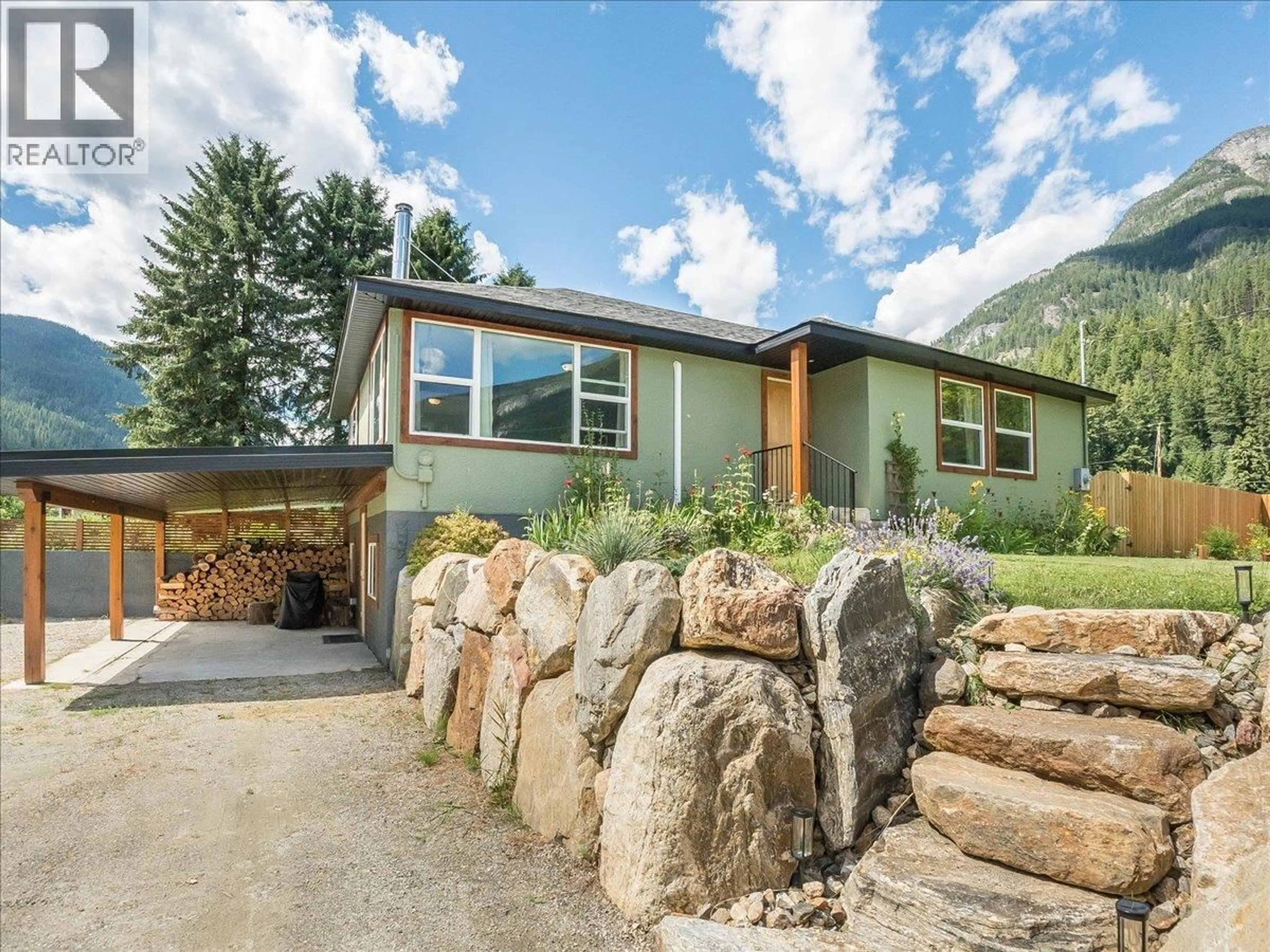 Home with vinyl exterior material, mountain view for 3177 SLOCAN PARK ROAD, Slocan Park British Columbia V0G2E0