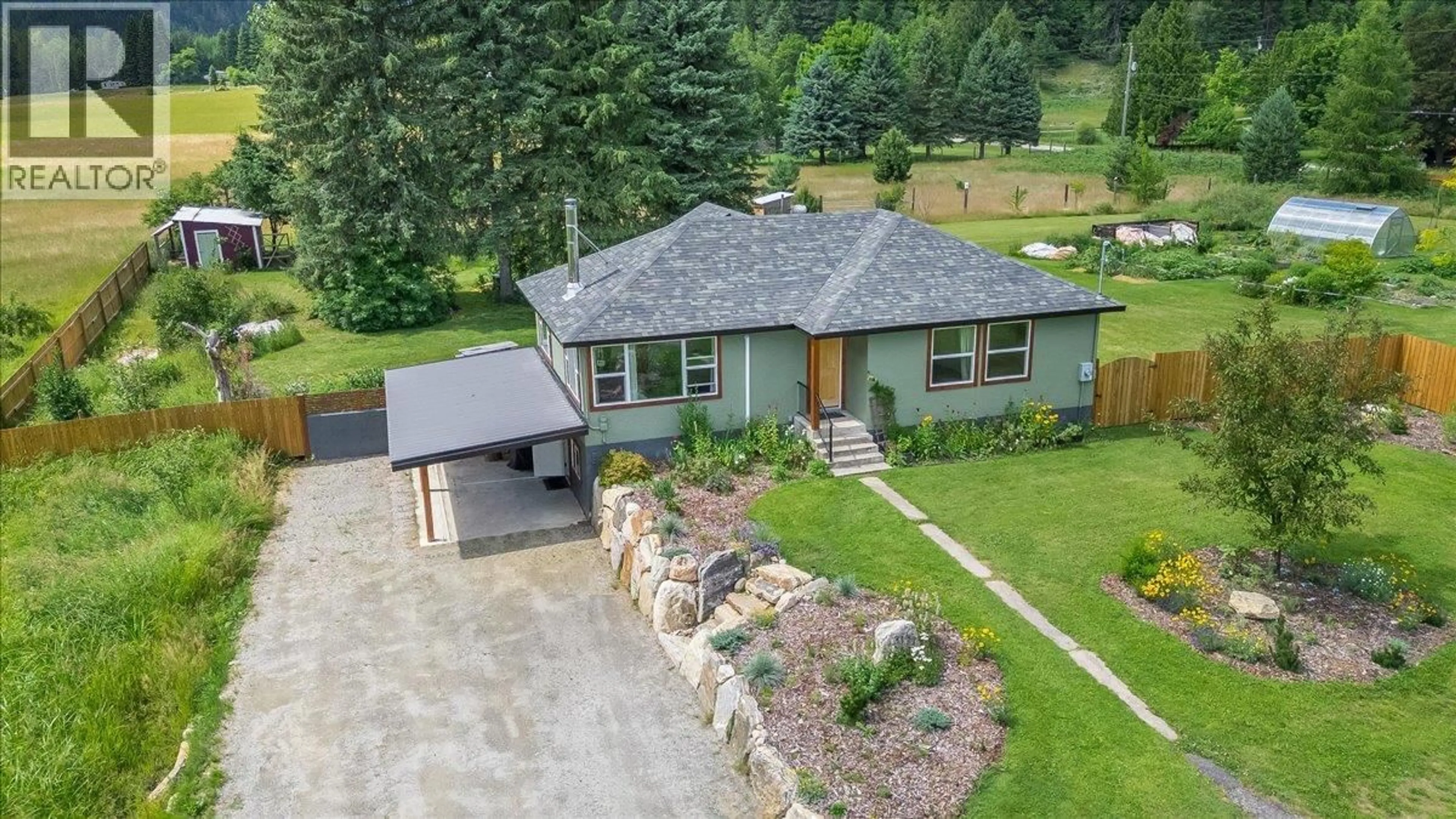 A pic from outside/outdoor area/front of a property/back of a property/a pic from drone, street for 3177 SLOCAN PARK ROAD, Slocan Park British Columbia V0G2E0