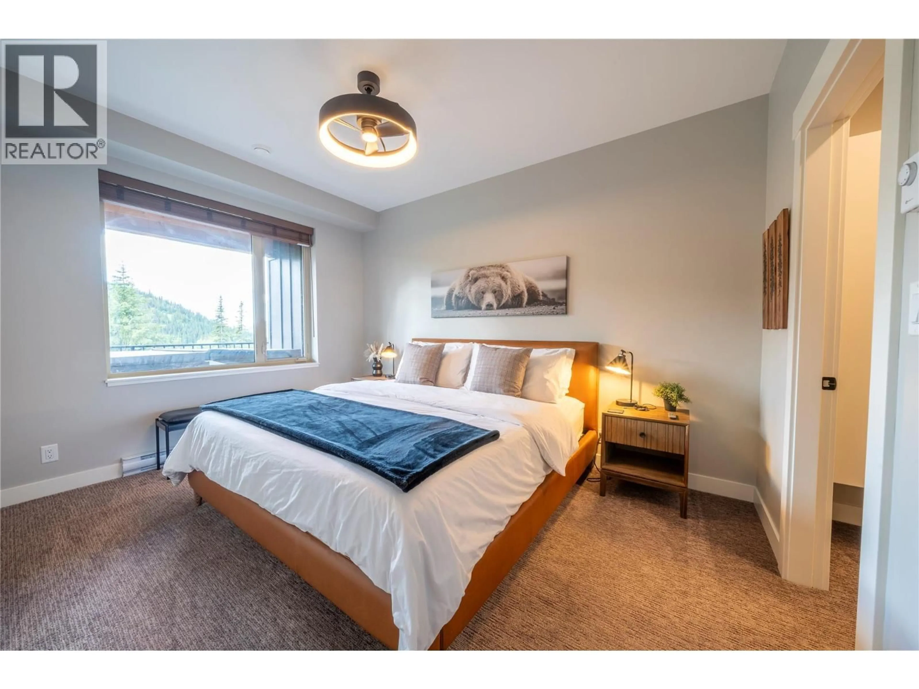 Bedroom with bed, wood/laminate floor for 14 - 5045 VALLEY DRIVE, Sun Peaks British Columbia V0E5N0