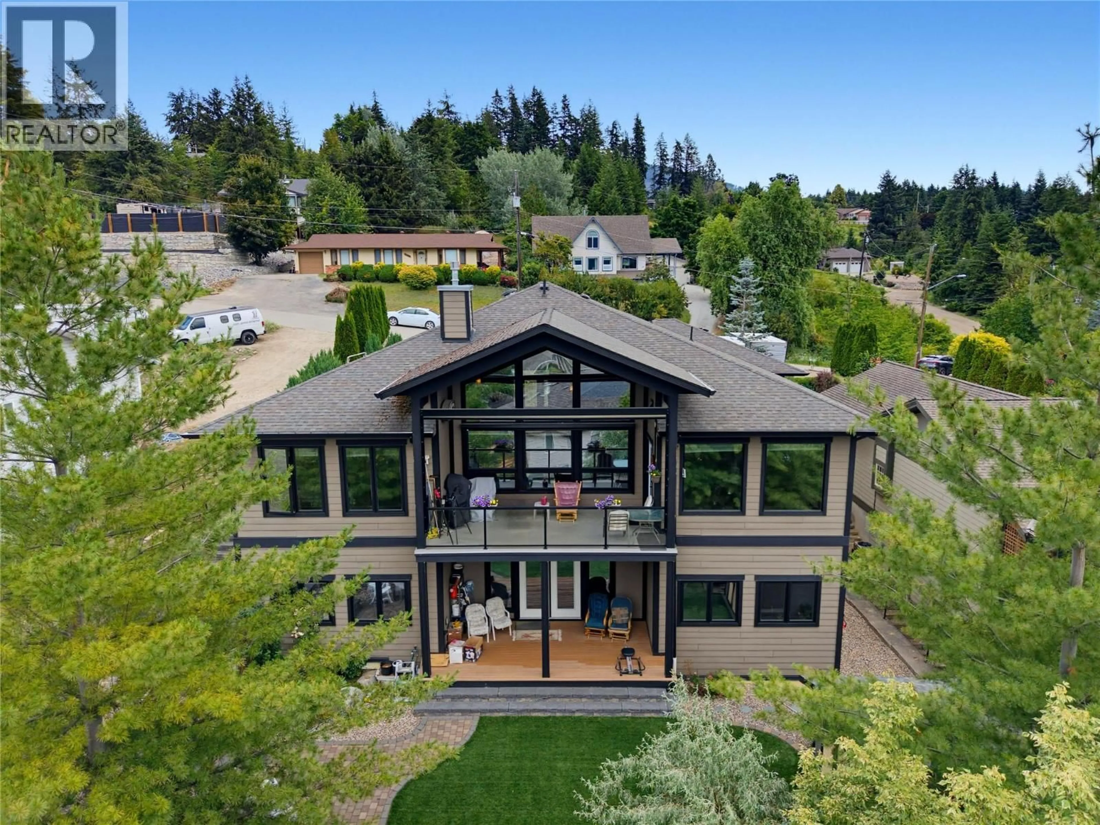 A pic from outside/outdoor area/front of a property/back of a property/a pic from drone, mountain view for 2421 25 STREET NORTHEAST, Salmon Arm British Columbia V1E2Z7
