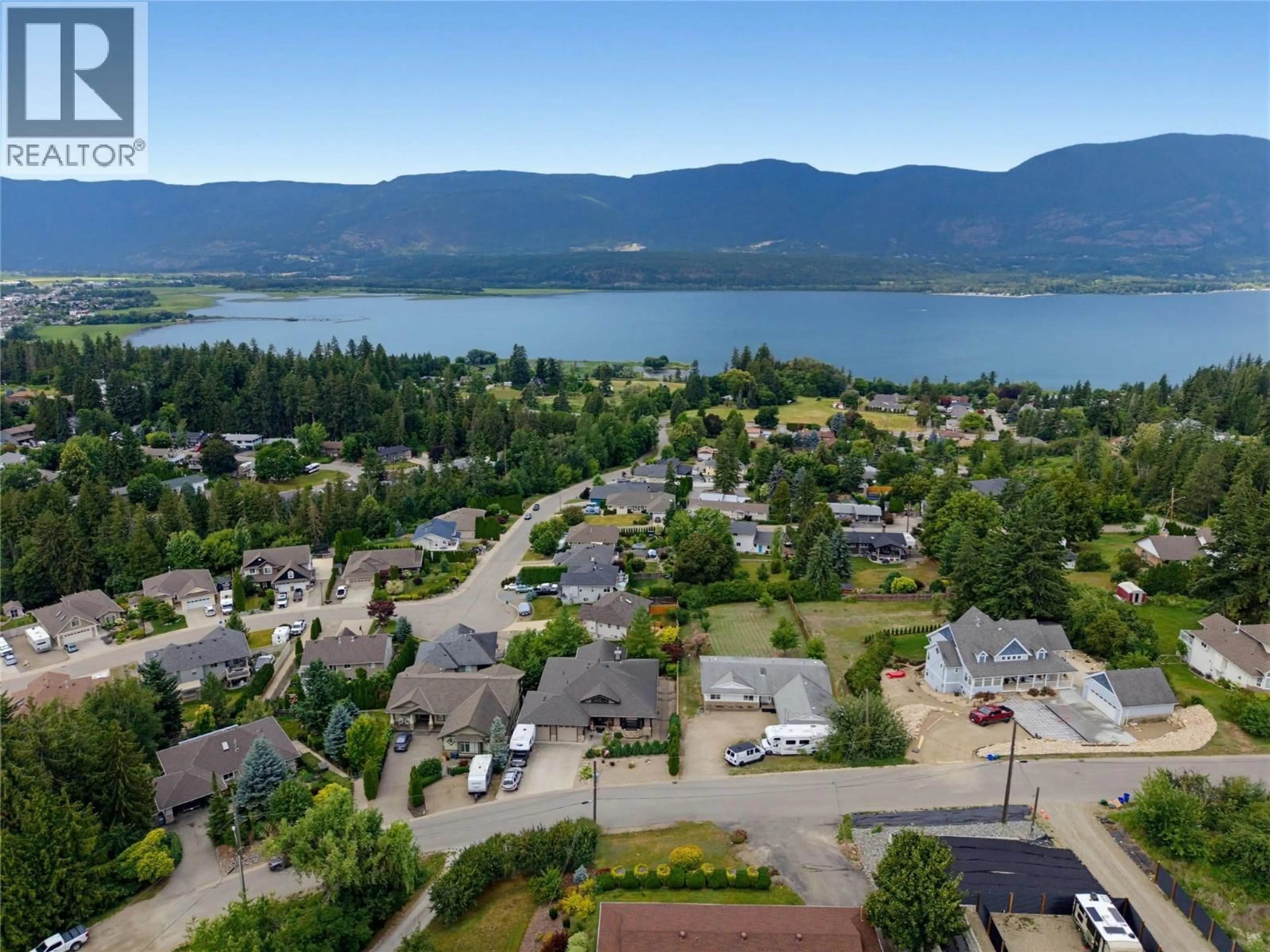 A pic from outside/outdoor area/front of a property/back of a property/a pic from drone, water/lake/river/ocean view for 2421 25 STREET NORTHEAST, Salmon Arm British Columbia V1E2Z7