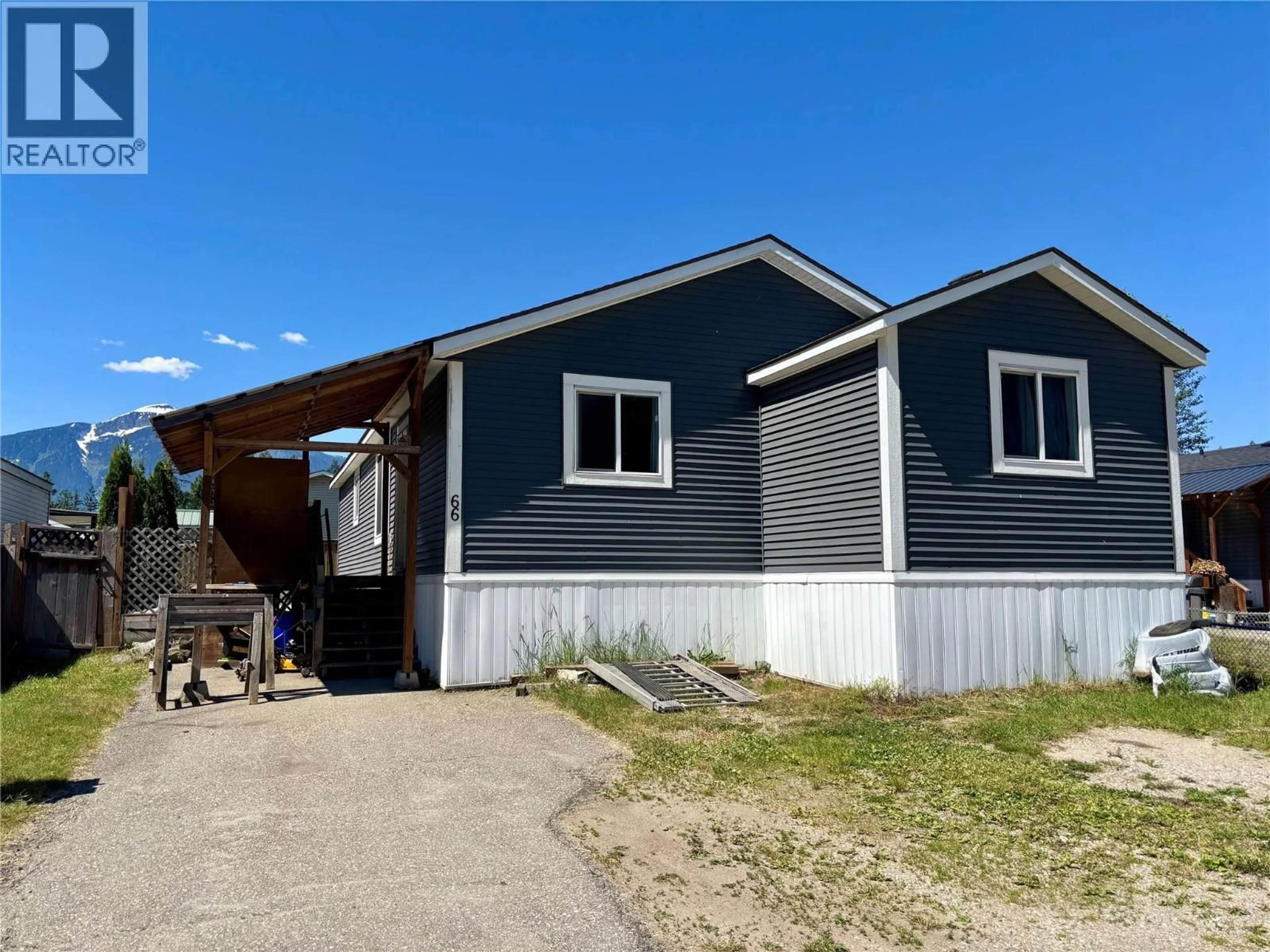 Home with vinyl exterior material, street for 66 JOHNSON WAY, Revelstoke British Columbia V0E2S1