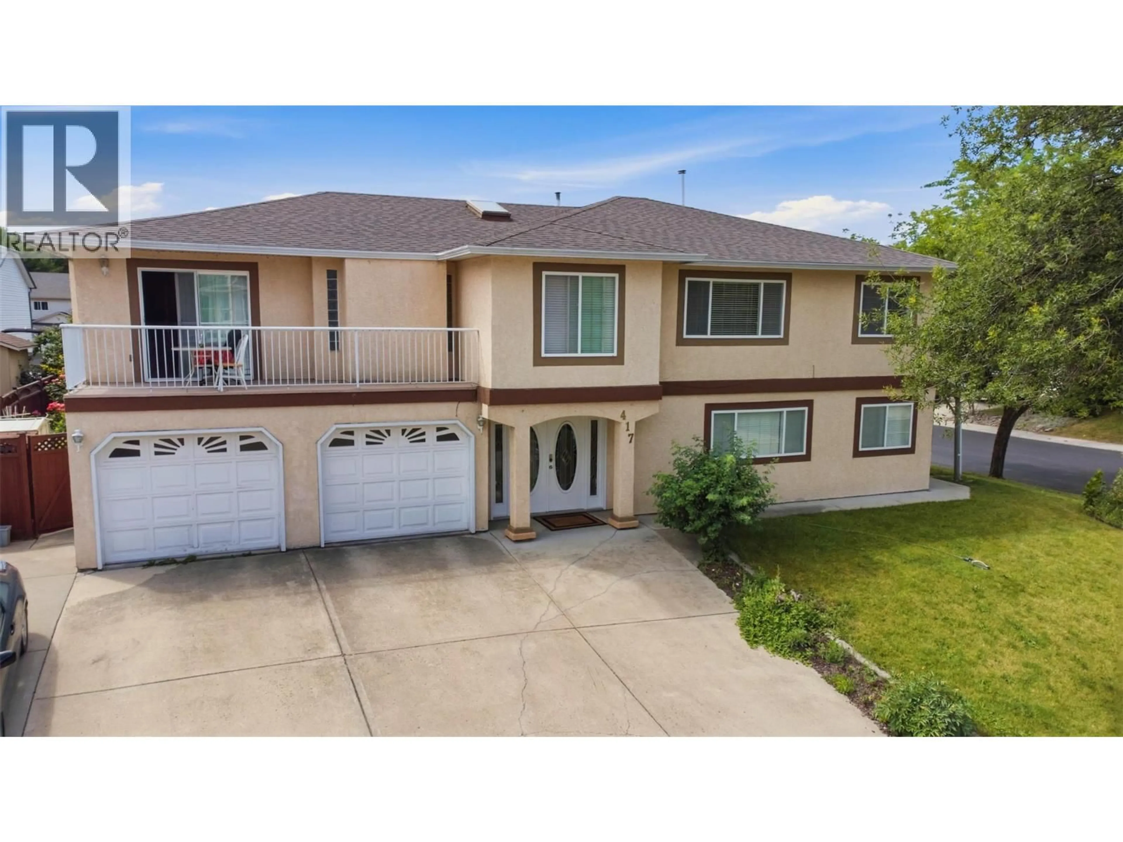A pic from outside/outdoor area/front of a property/back of a property/a pic from drone, street for 417 WIGGLESWORTH CRESCENT, Kelowna British Columbia V1X7N3