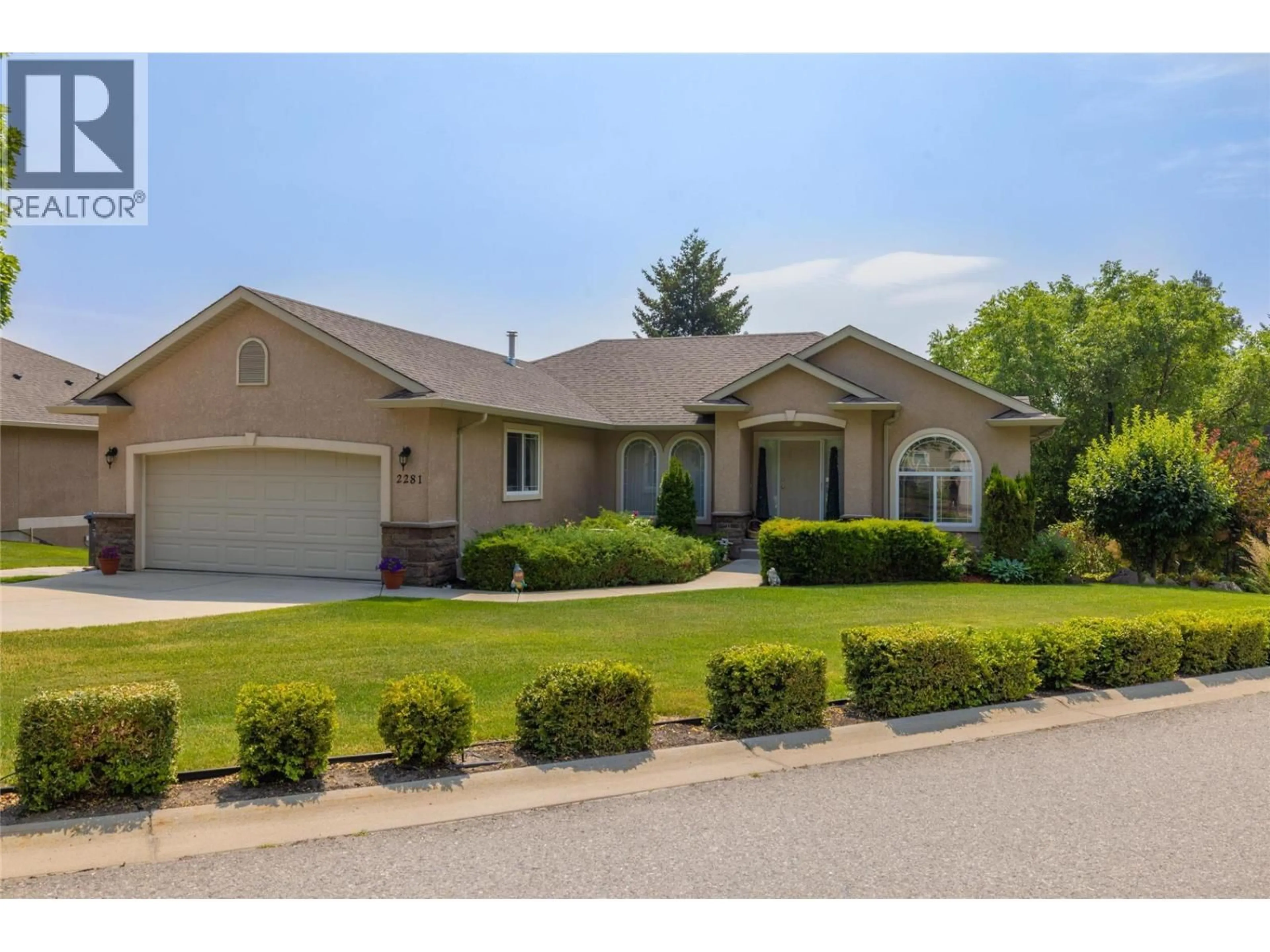 Home with vinyl exterior material, street for 2281 SHANNON HEIGHTS COURT, West Kelowna British Columbia V4T2V1