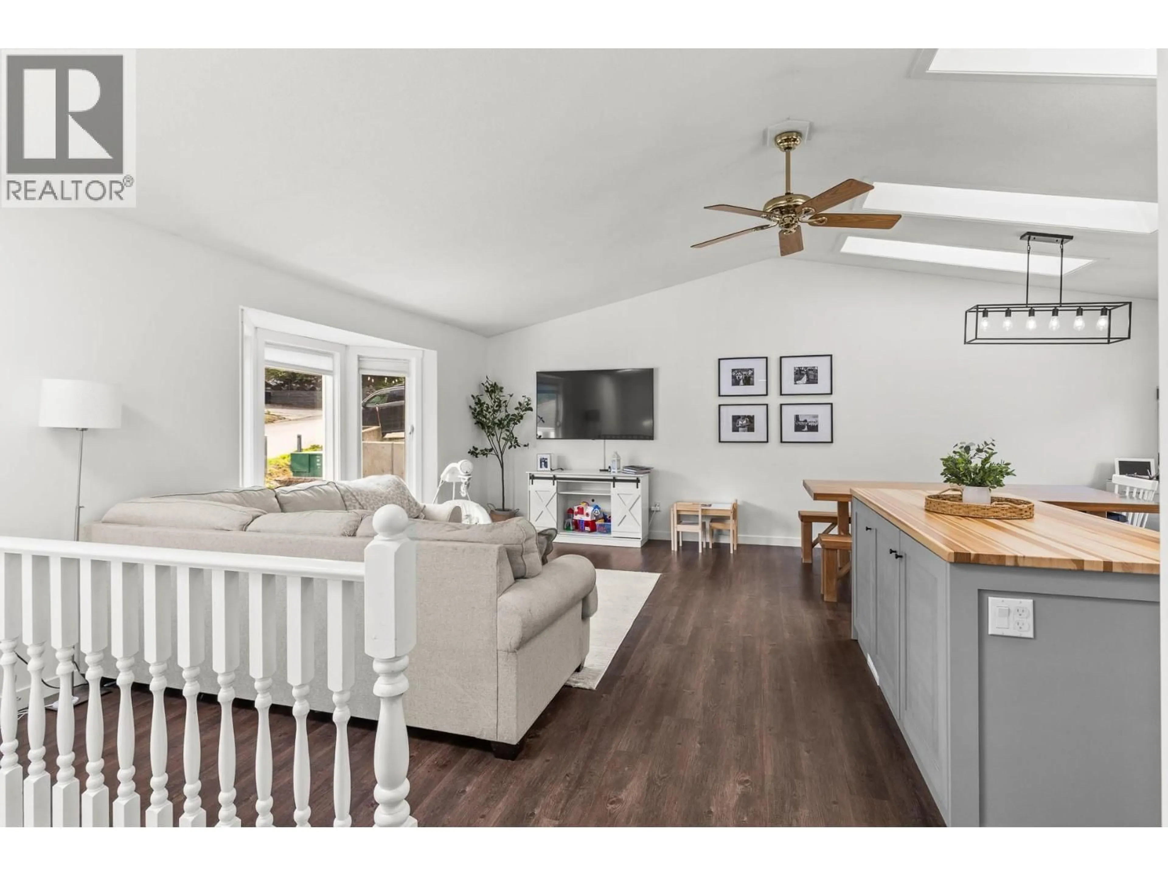 Open concept kitchen, wood/laminate floor for 3910 HIGHLAND PARK CRESCENT, Armstrong British Columbia V4Y0K2