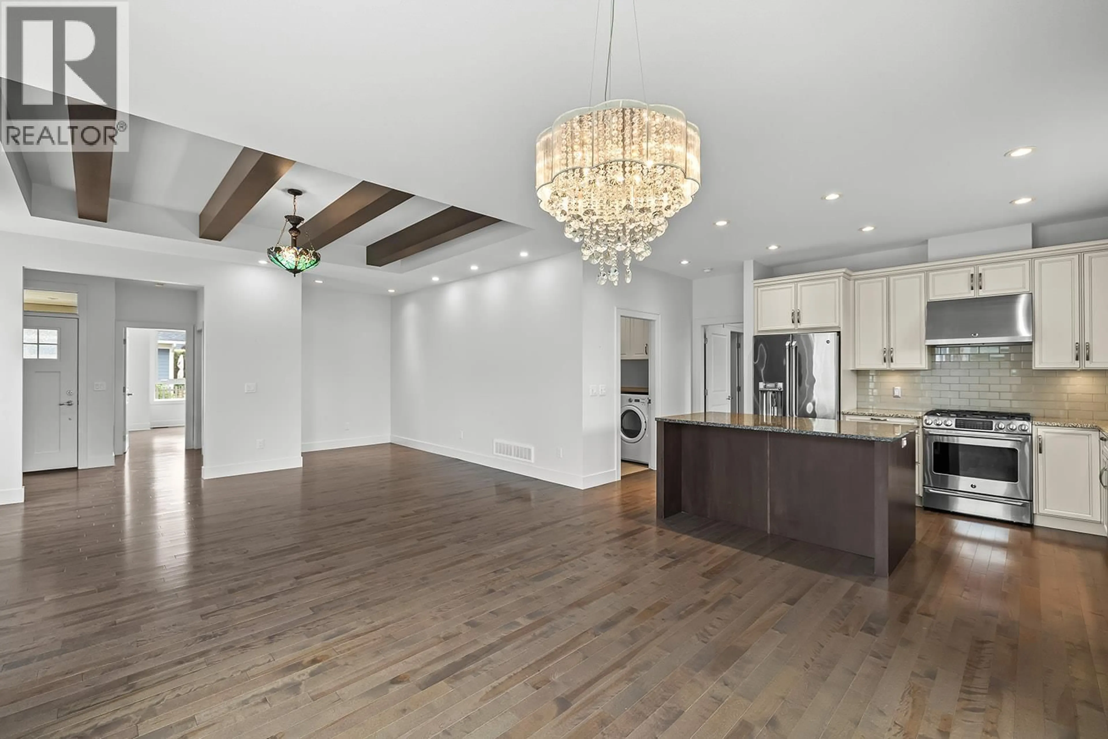 Open concept kitchen, wood/laminate floor for 34 - 1960 KLO ROAD, Kelowna British Columbia V1W5L2