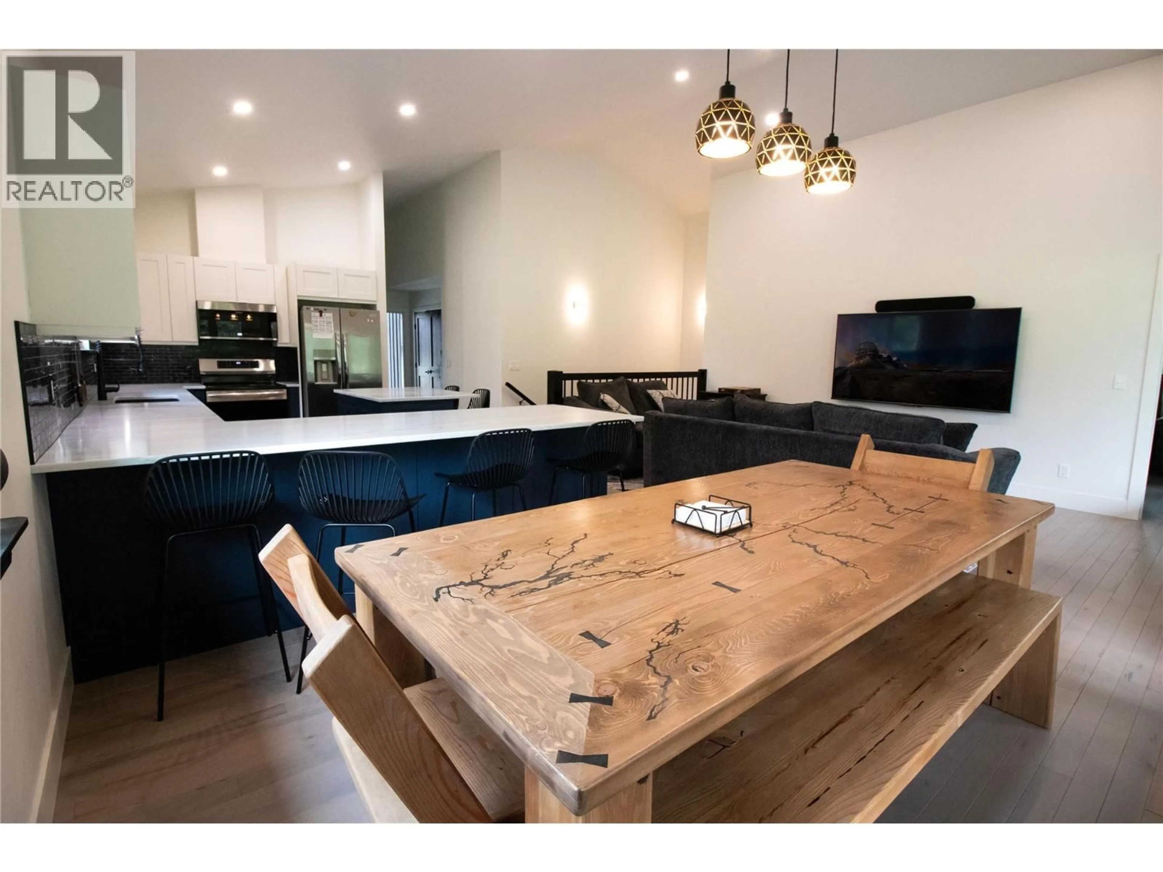 Open concept kitchen, wood/laminate floor for 2552 SANDSTONE MEWS, Invermere British Columbia V0A1K6