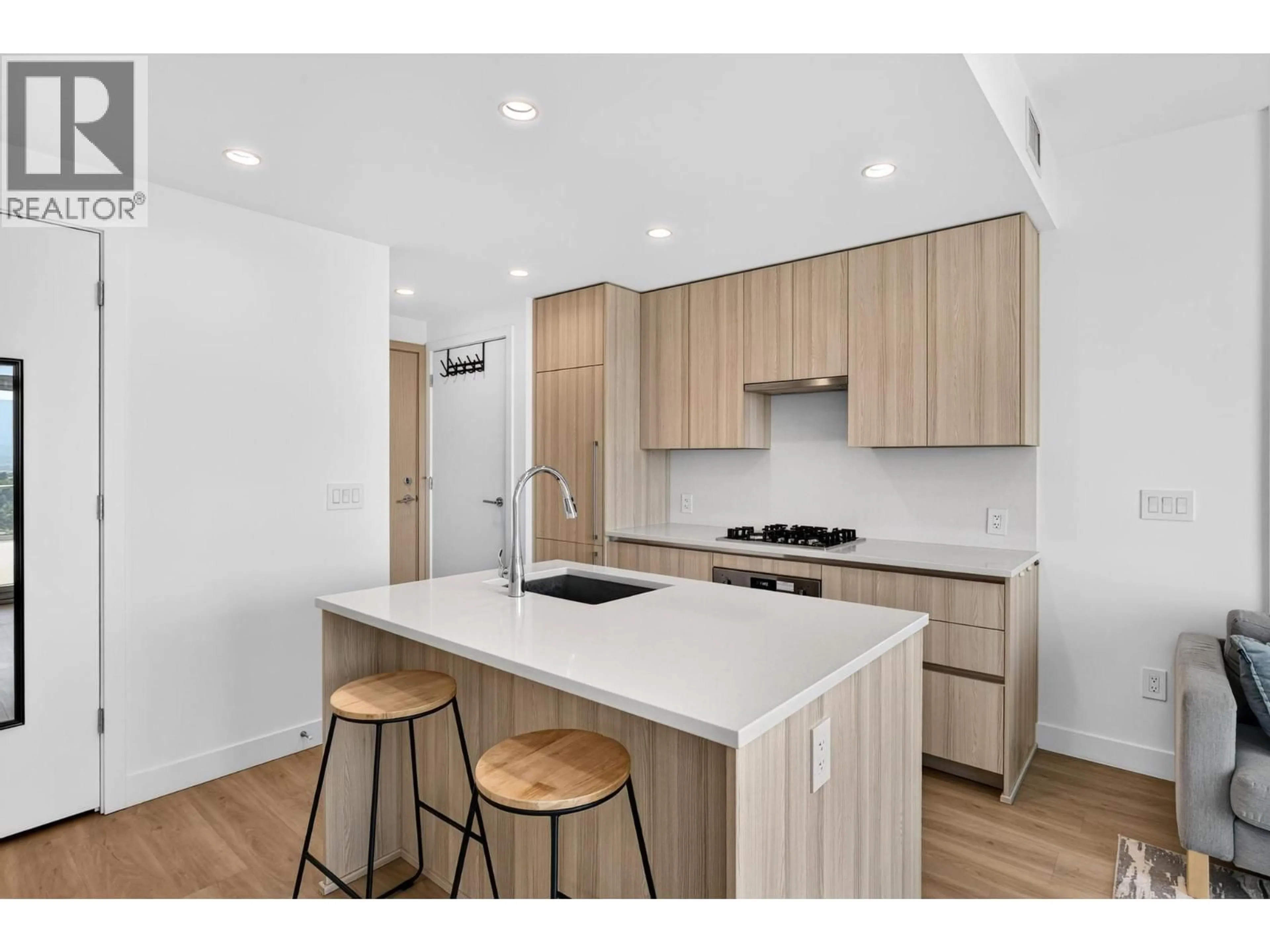Open concept kitchen, wood/laminate floor for 1505 - 1626 WATER STREET, Kelowna British Columbia V1Y0N7