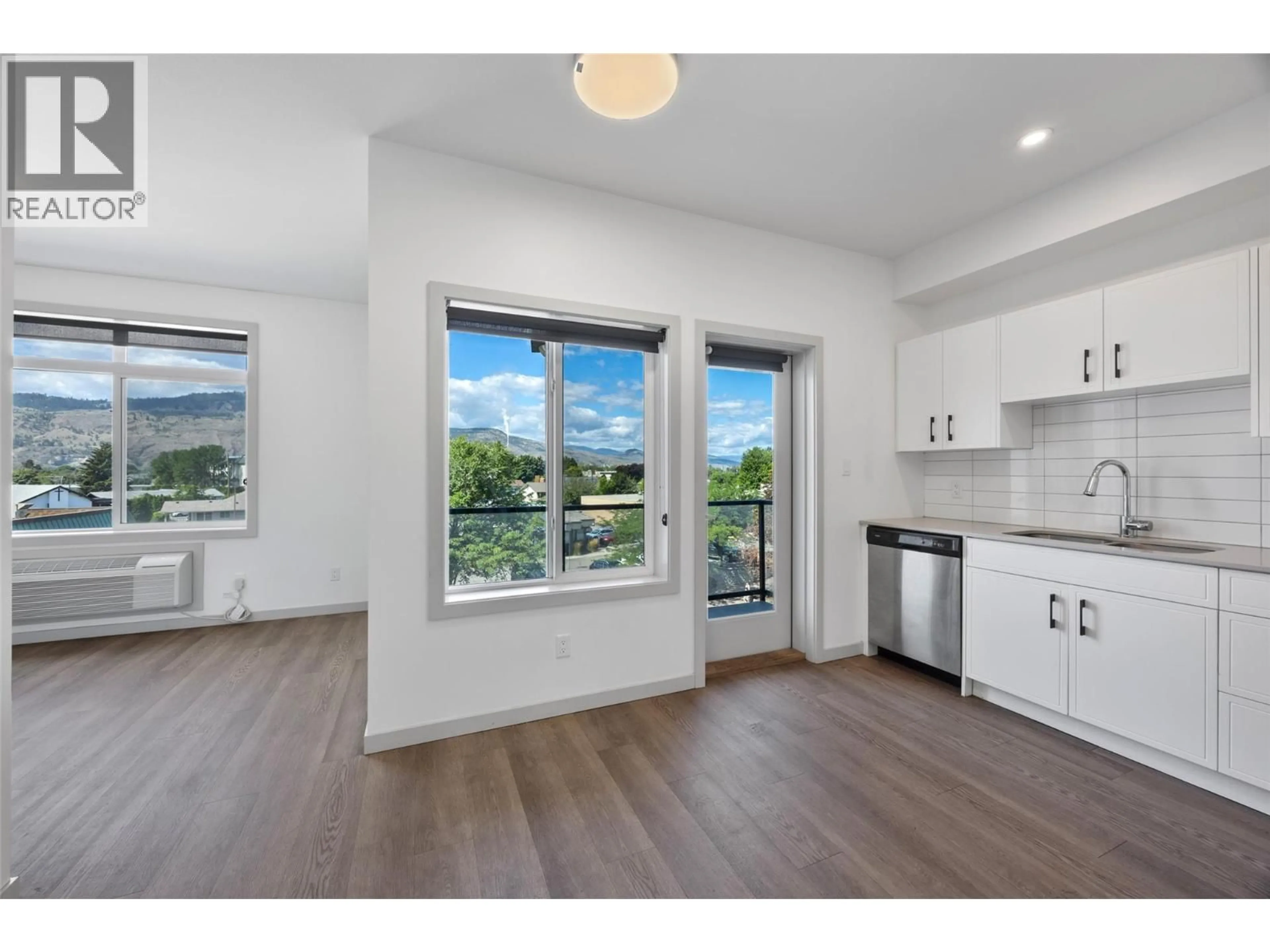 Open concept kitchen, wood/laminate floor for 302 - 766 TRANQUILLE ROAD, Kamloops British Columbia V2B3J2