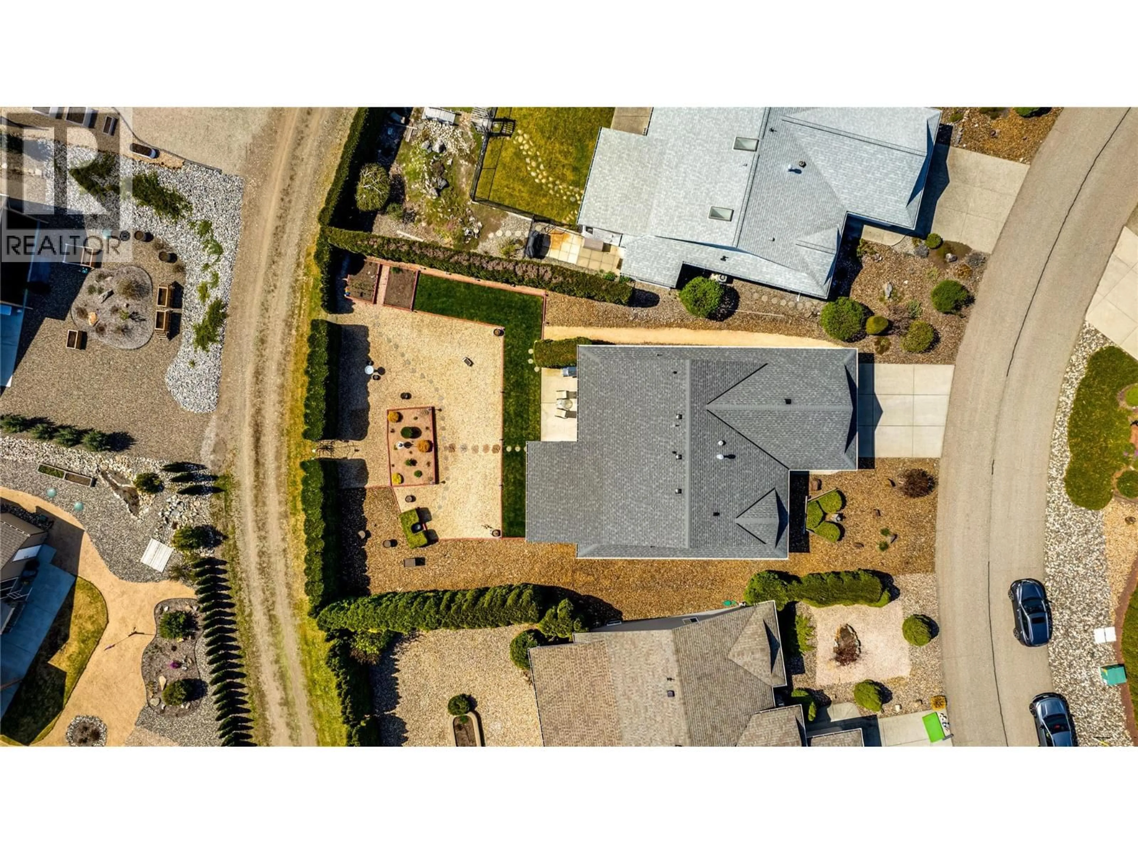A pic from outside/outdoor area/front of a property/back of a property/a pic from drone, street for 855 8 AVENUE, Vernon British Columbia V1H1Z1