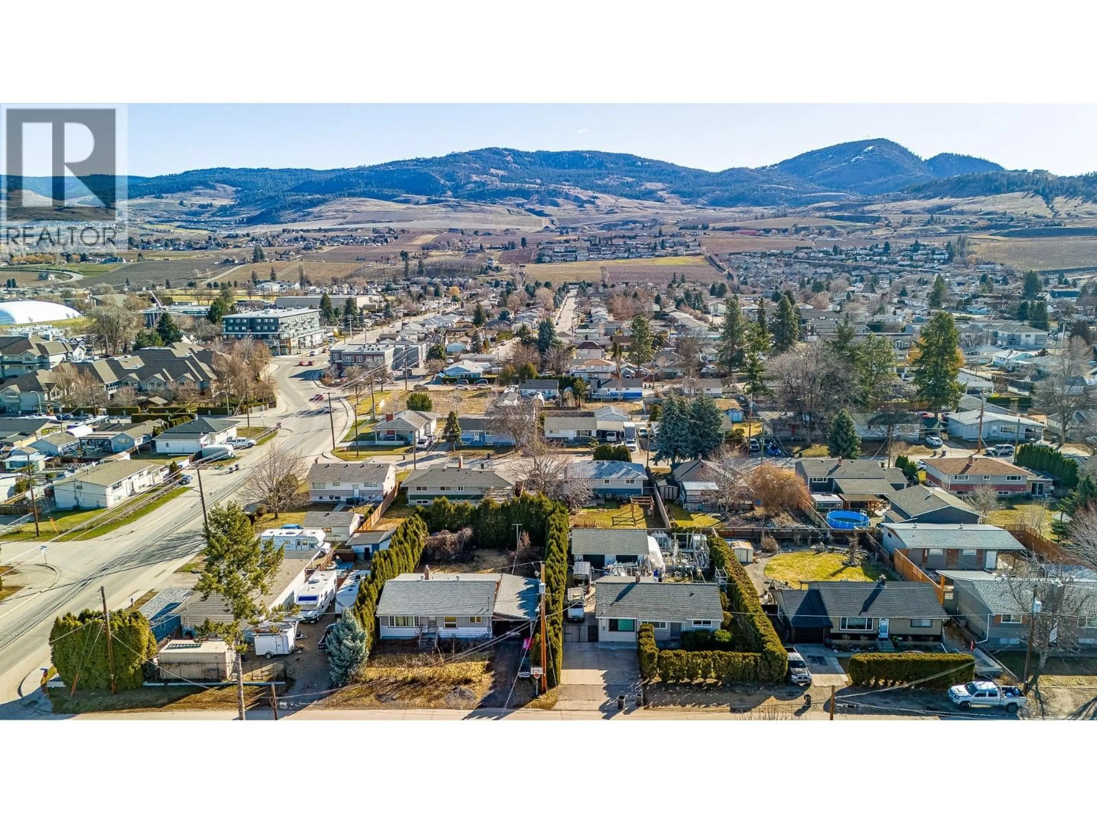 A pic from outside/outdoor area/front of a property/back of a property/a pic from drone, mountain view for 525 MCDONALD ROAD, Kelowna British Columbia V1X3H3