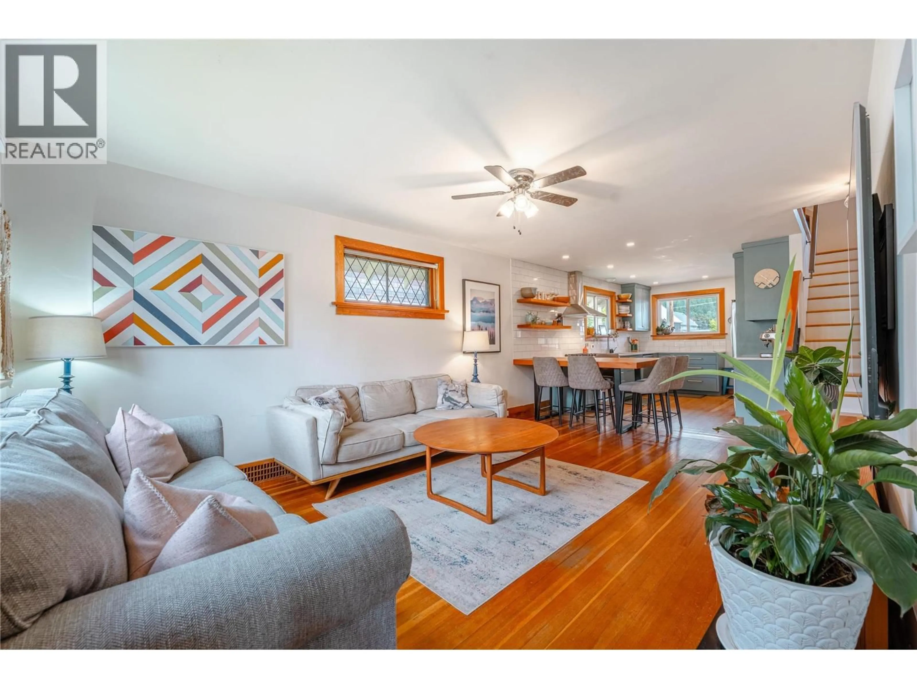 Living room with furniture, wood/laminate floor for 412 THIRD STREET EAST, Revelstoke British Columbia V0E2S0