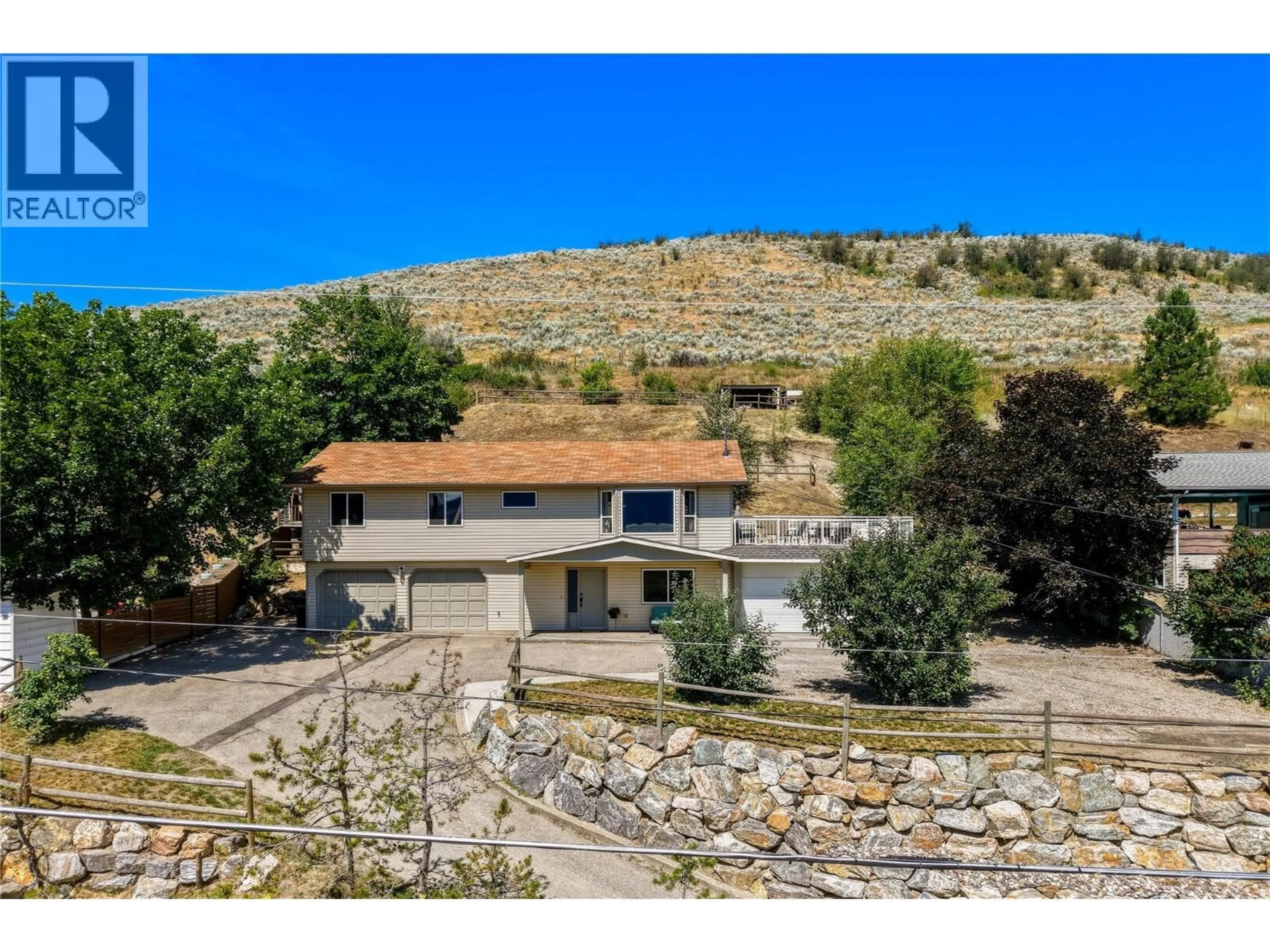 A pic from outside/outdoor area/front of a property/back of a property/a pic from drone, mountain view for 6512 BLUE JAY ROAD, Vernon British Columbia V1H1W4