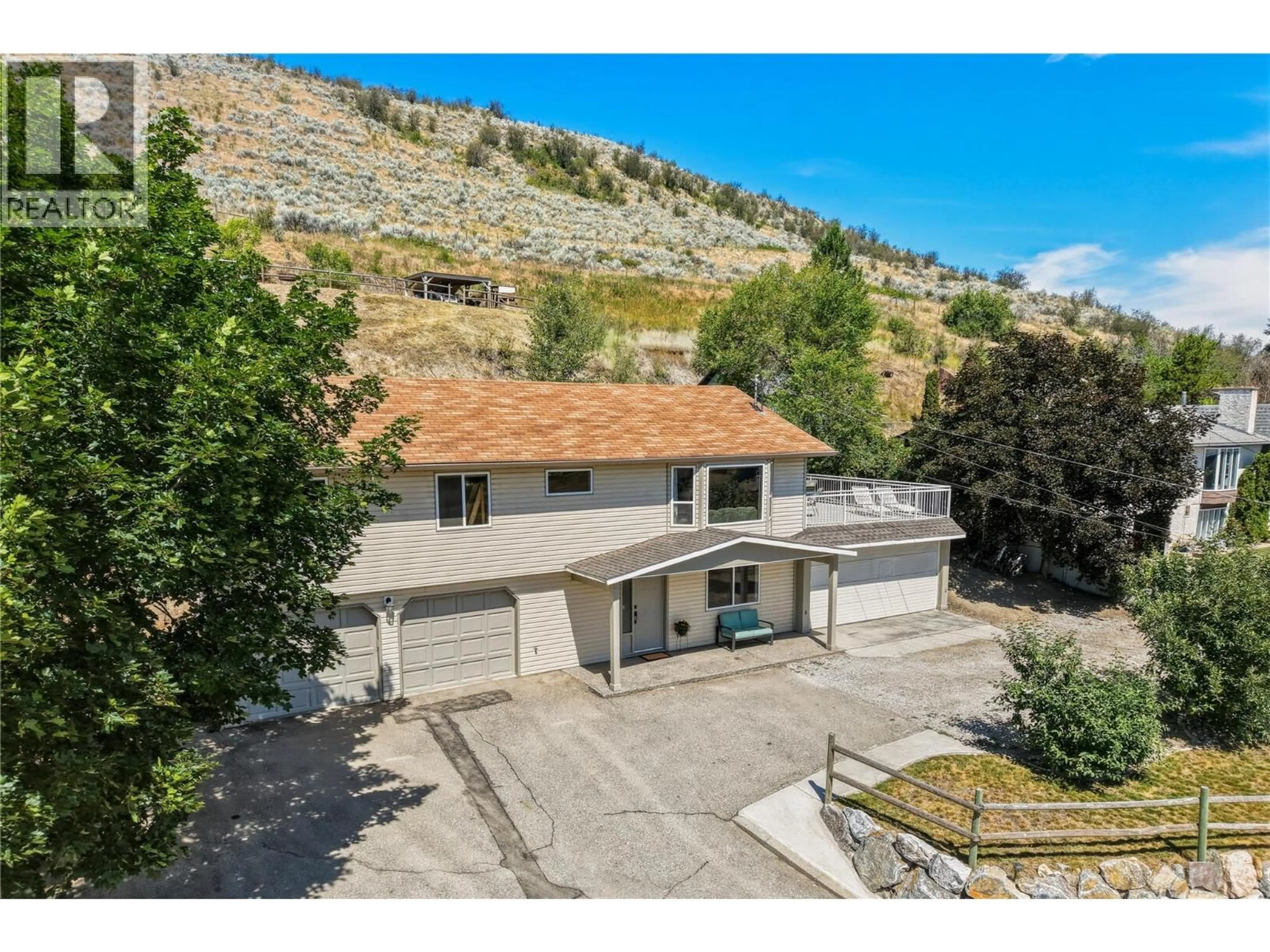 A pic from outside/outdoor area/front of a property/back of a property/a pic from drone, mountain view for 6512 BLUE JAY ROAD, Vernon British Columbia V1H1W4