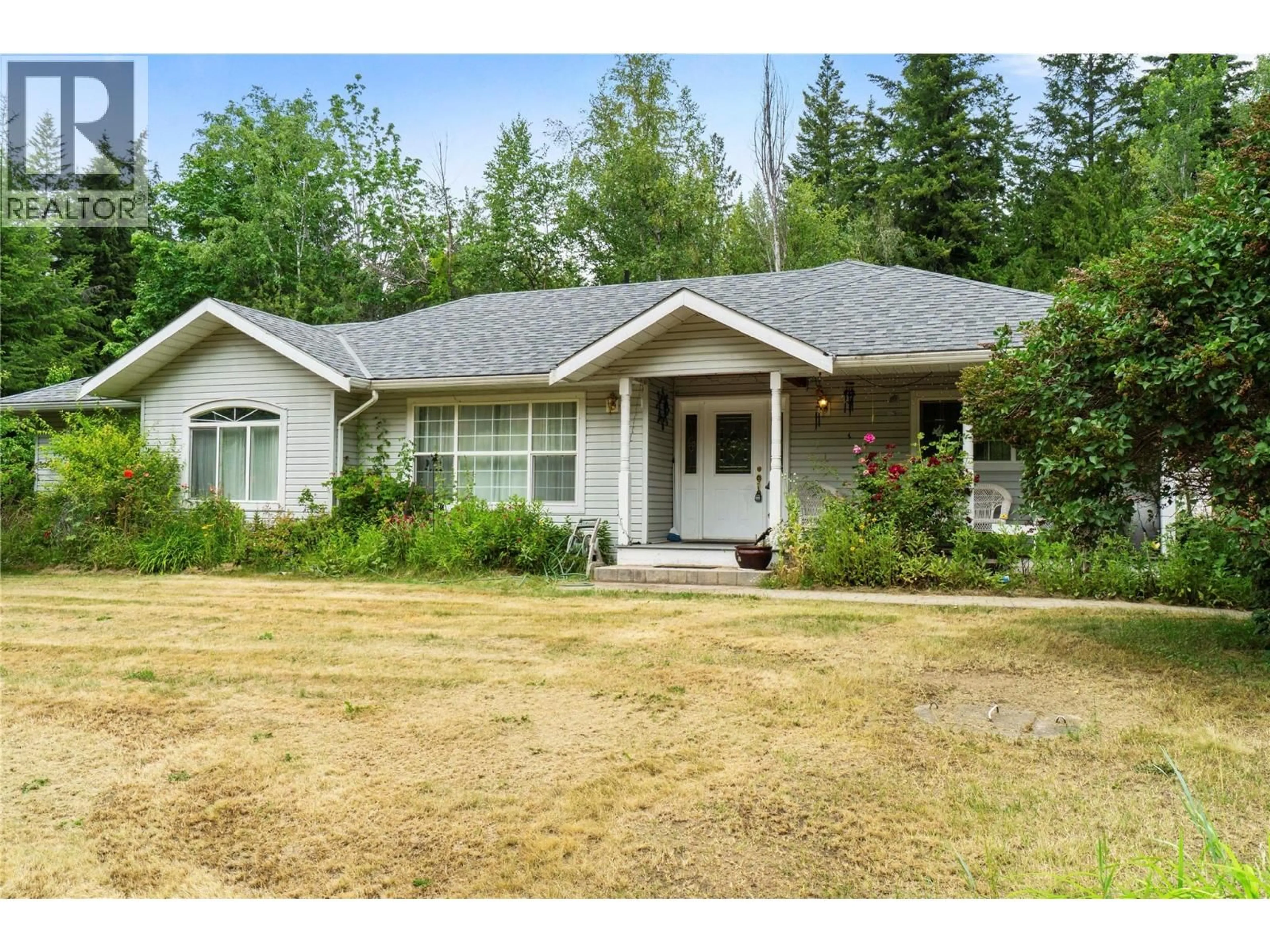 Home with vinyl exterior material, street for 3915 EXPRESS POINT ROAD, Scotch Creek British Columbia V0E1M5