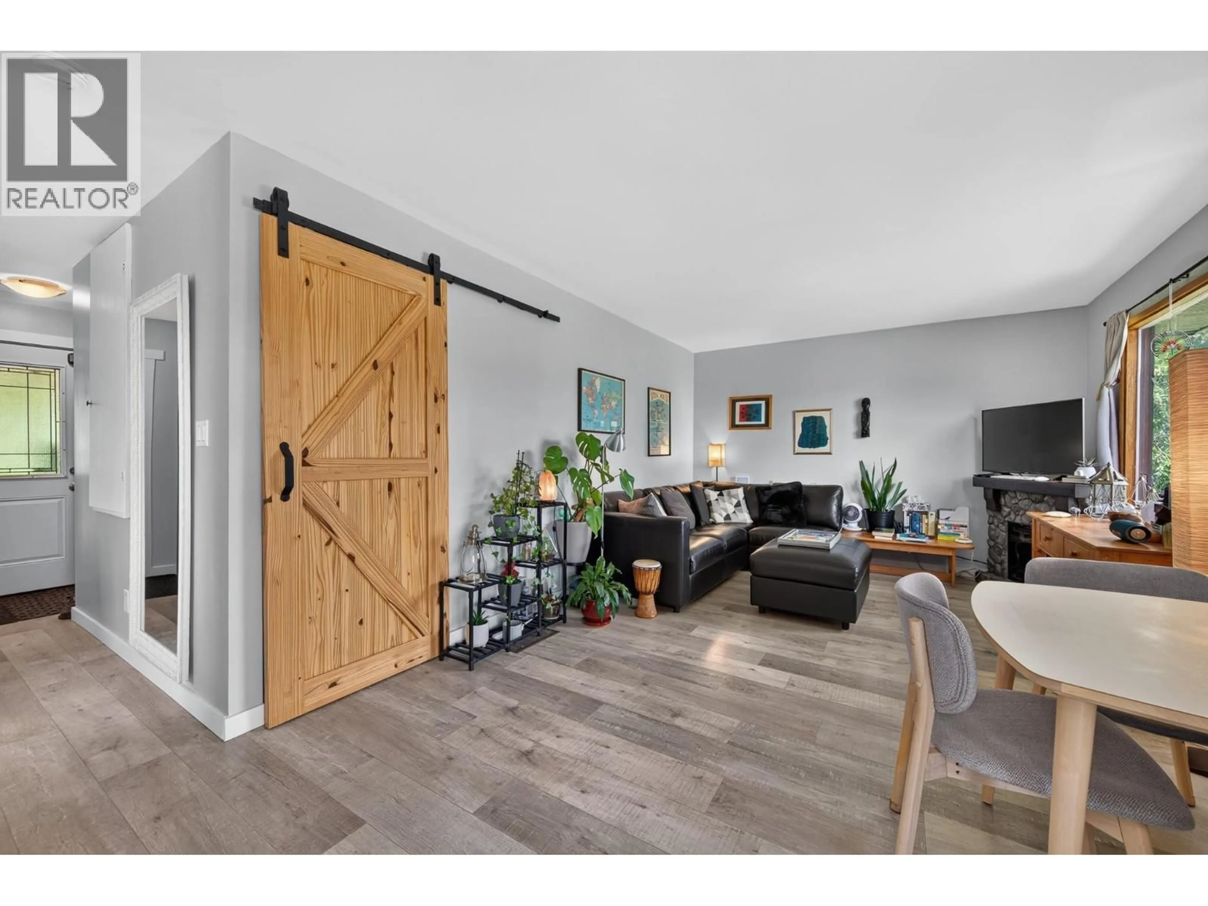Living room with furniture, wood/laminate floor for 3041 HOLBROOK ROAD, Kamloops British Columbia V0E3E1