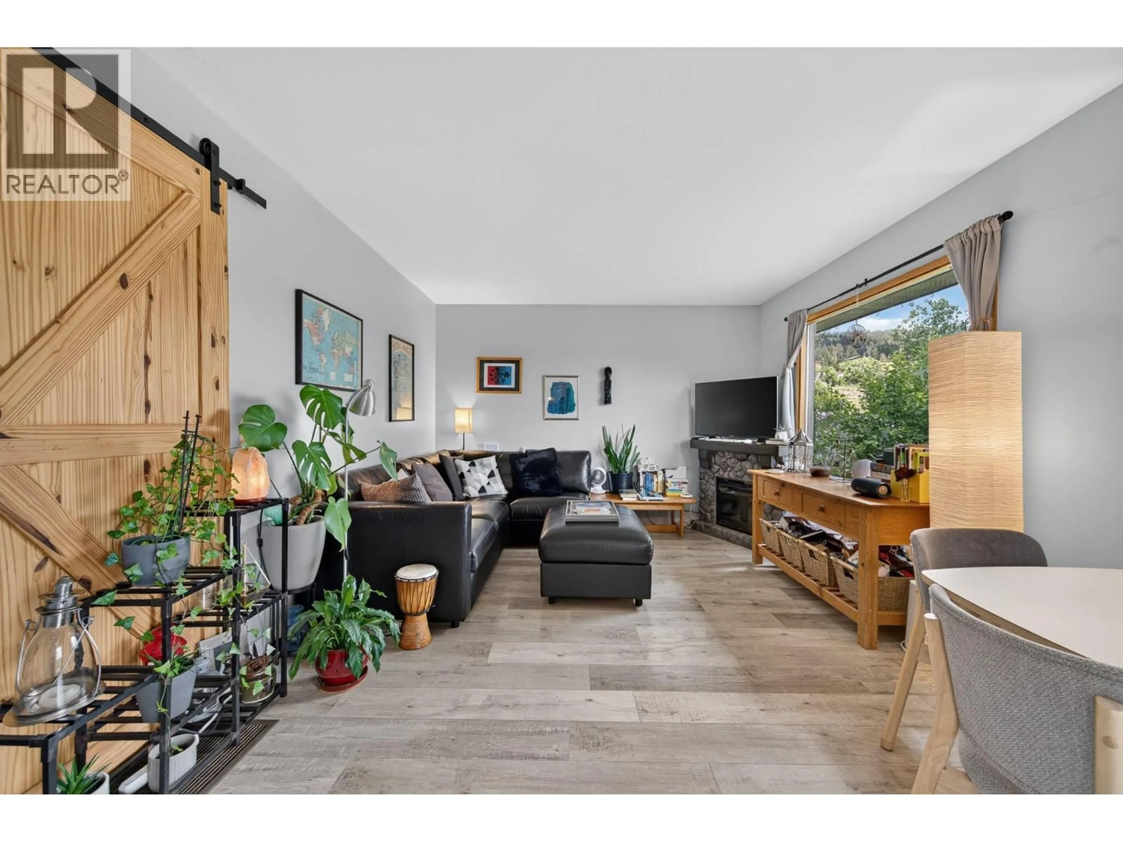 Living room with furniture, wood/laminate floor for 3041 HOLBROOK ROAD, Kamloops British Columbia V0E3E1