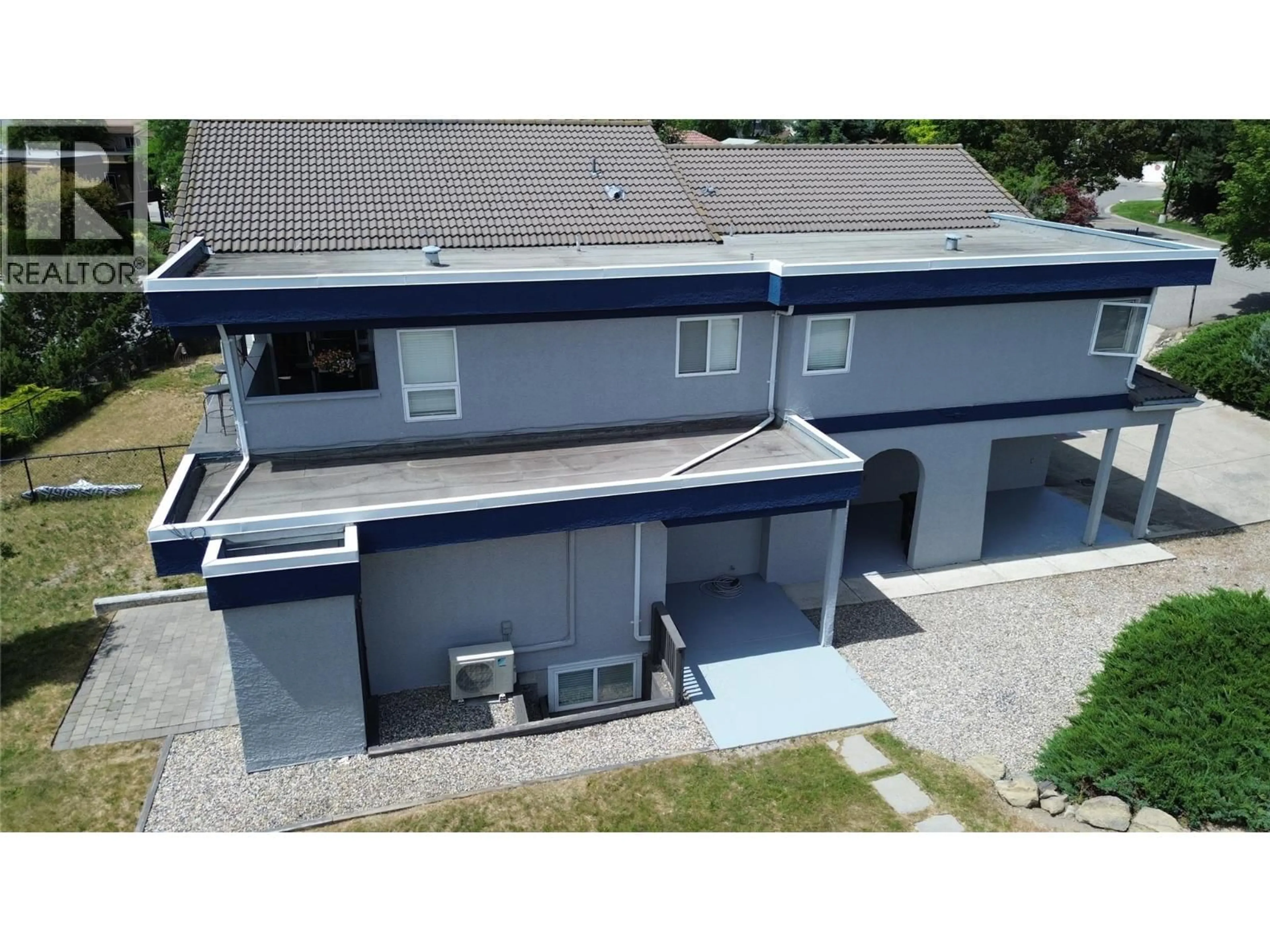 A pic from outside/outdoor area/front of a property/back of a property/a pic from drone, building for 126 VERNA COURT, Kelowna British Columbia V1V1S9