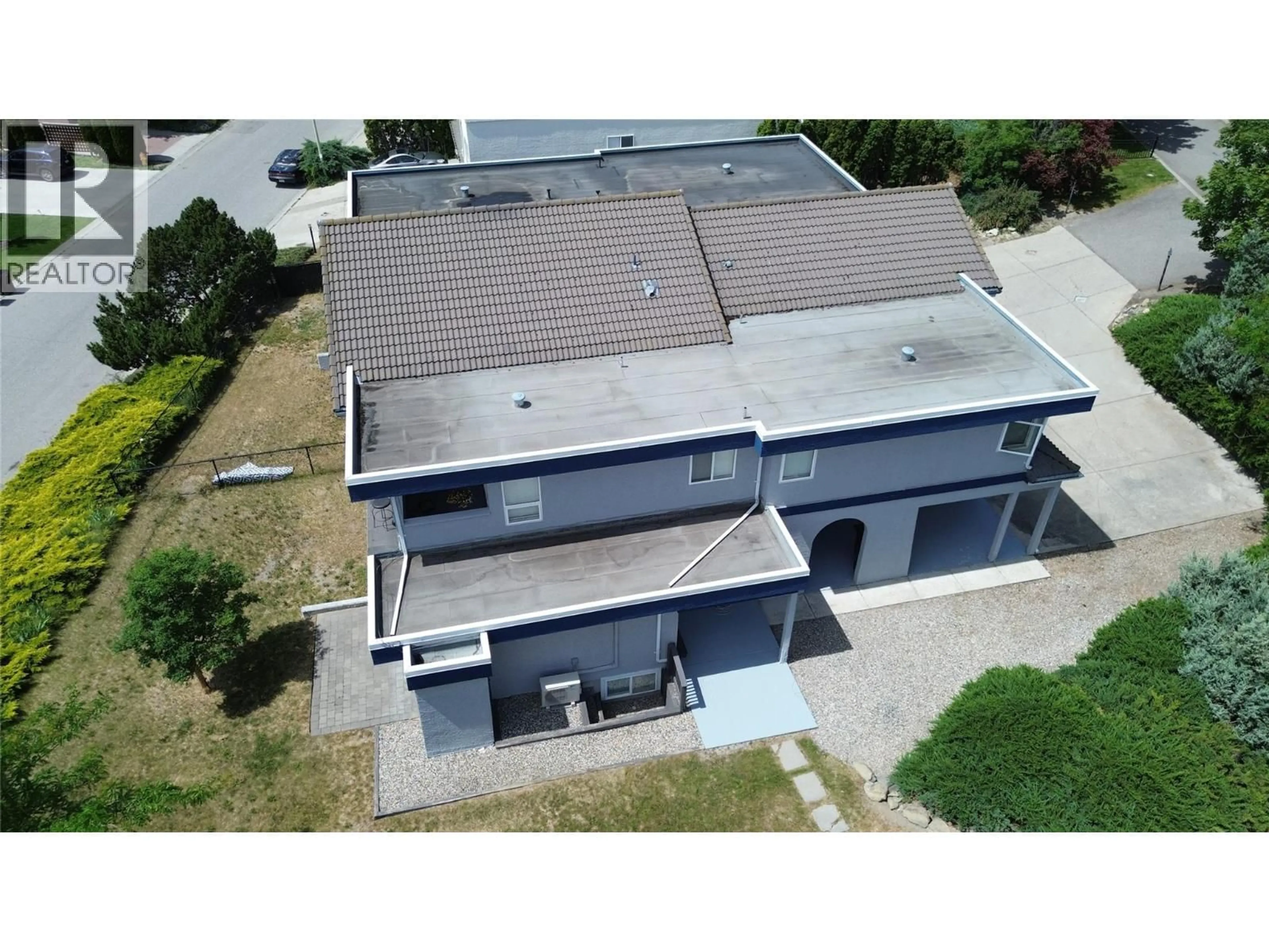 A pic from outside/outdoor area/front of a property/back of a property/a pic from drone, building for 126 VERNA COURT, Kelowna British Columbia V1V1S9