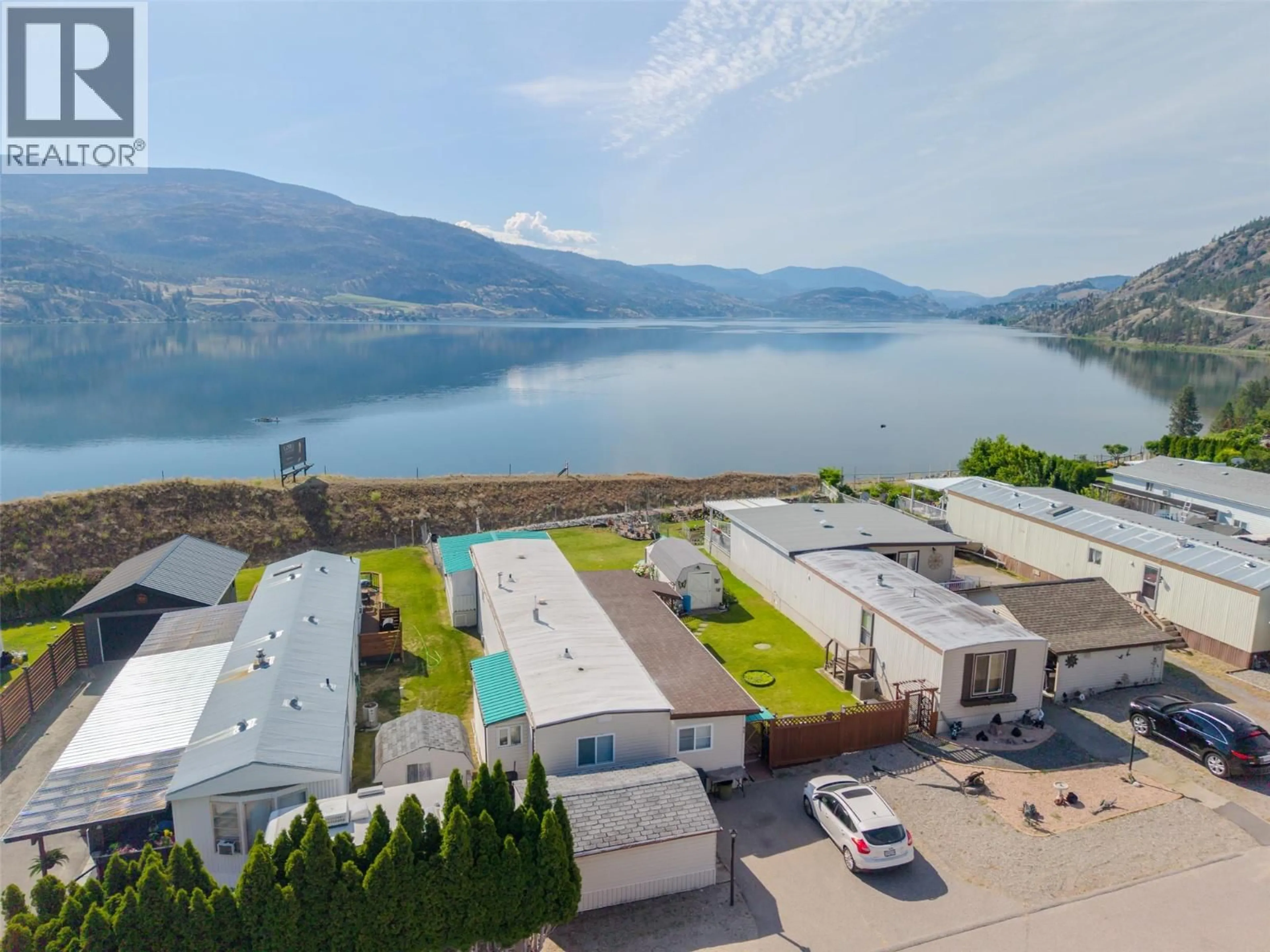 A pic from outside/outdoor area/front of a property/back of a property/a pic from drone, water/lake/river/ocean view for 35 - 201 HIGHWAY 97 OTHER, Penticton British Columbia V2A0E4