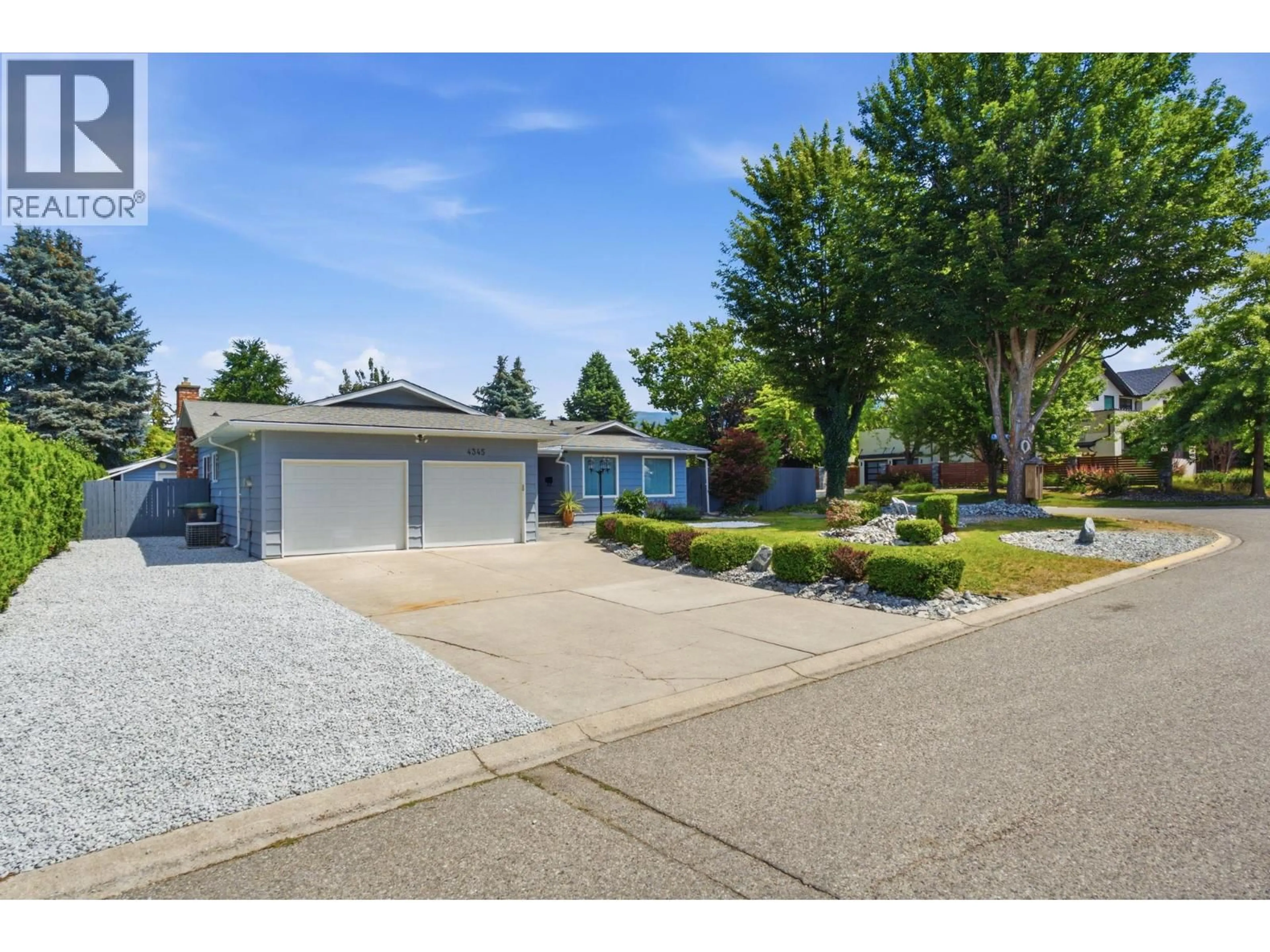 A pic from outside/outdoor area/front of a property/back of a property/a pic from drone, street for 4345 DUNVEGAN COURT, Kelowna British Columbia V1W1S9