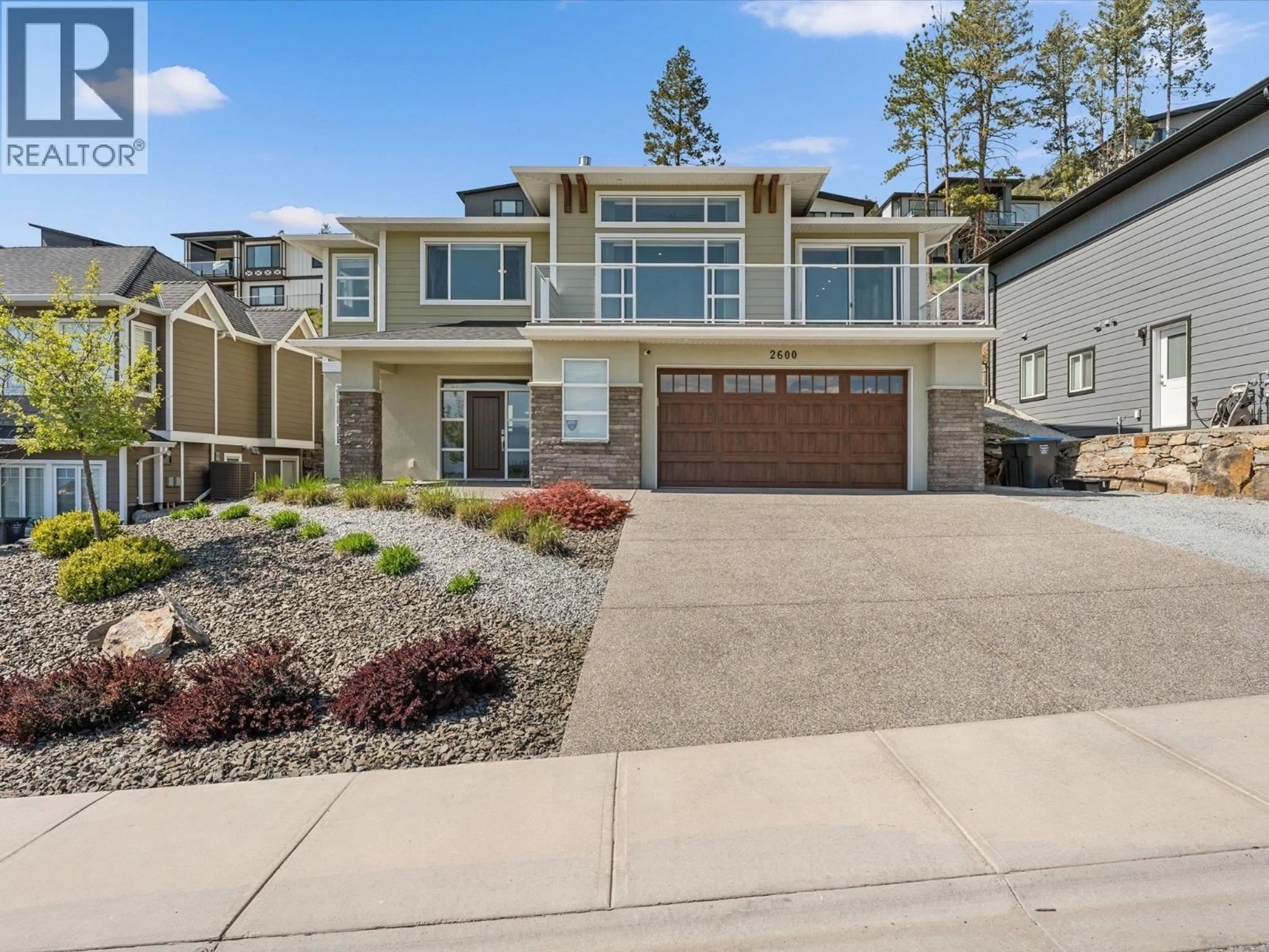 Home with vinyl exterior material, street for 2600 PARAMOUNT DRIVE, West Kelowna British Columbia V4T3M6