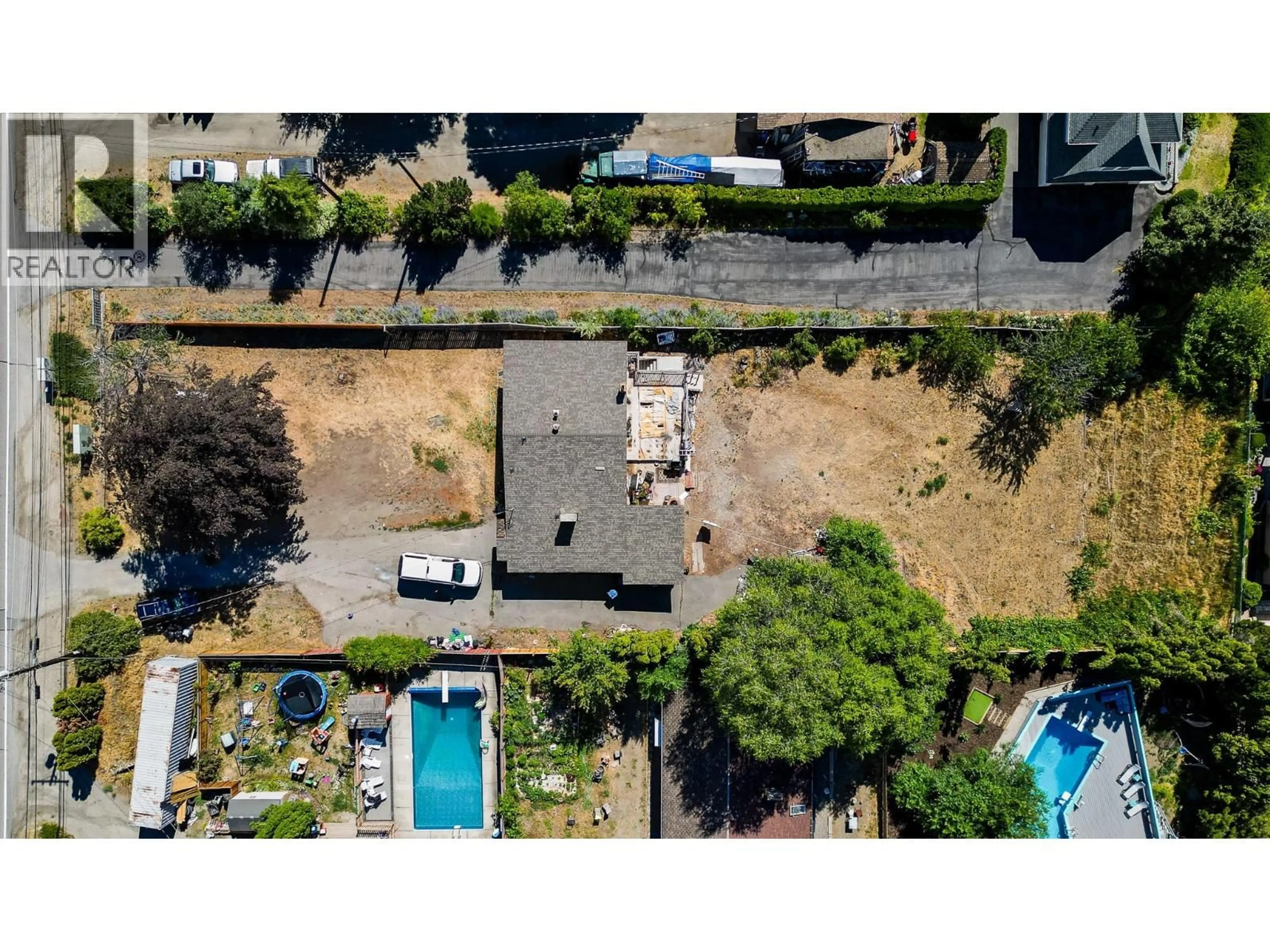 A pic from outside/outdoor area/front of a property/back of a property/a pic from drone, street for 2489 REECE ROAD, West Kelowna British Columbia V4T1N1