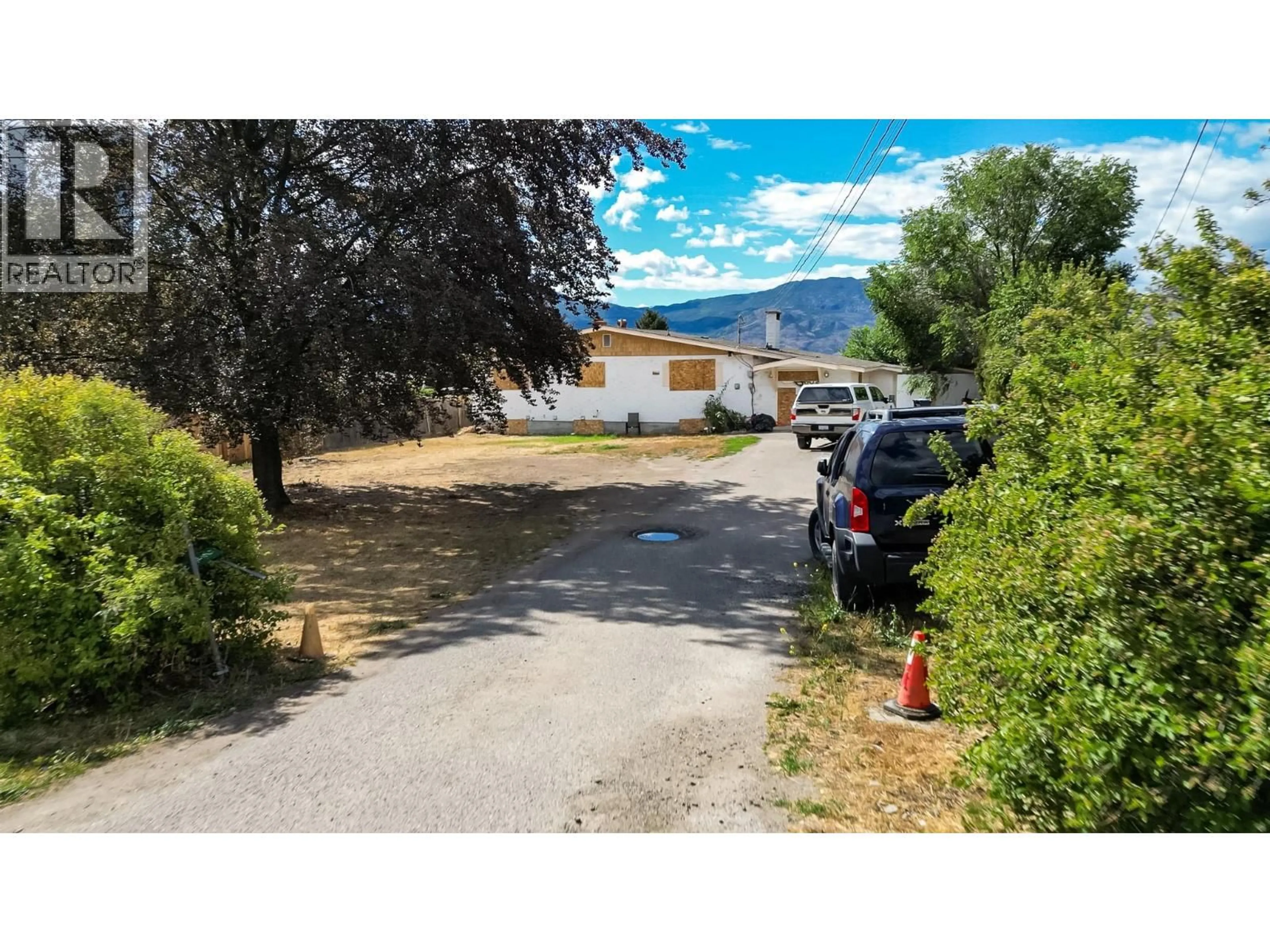A pic from outside/outdoor area/front of a property/back of a property/a pic from drone, street for 2489 REECE ROAD, West Kelowna British Columbia V4T1N1