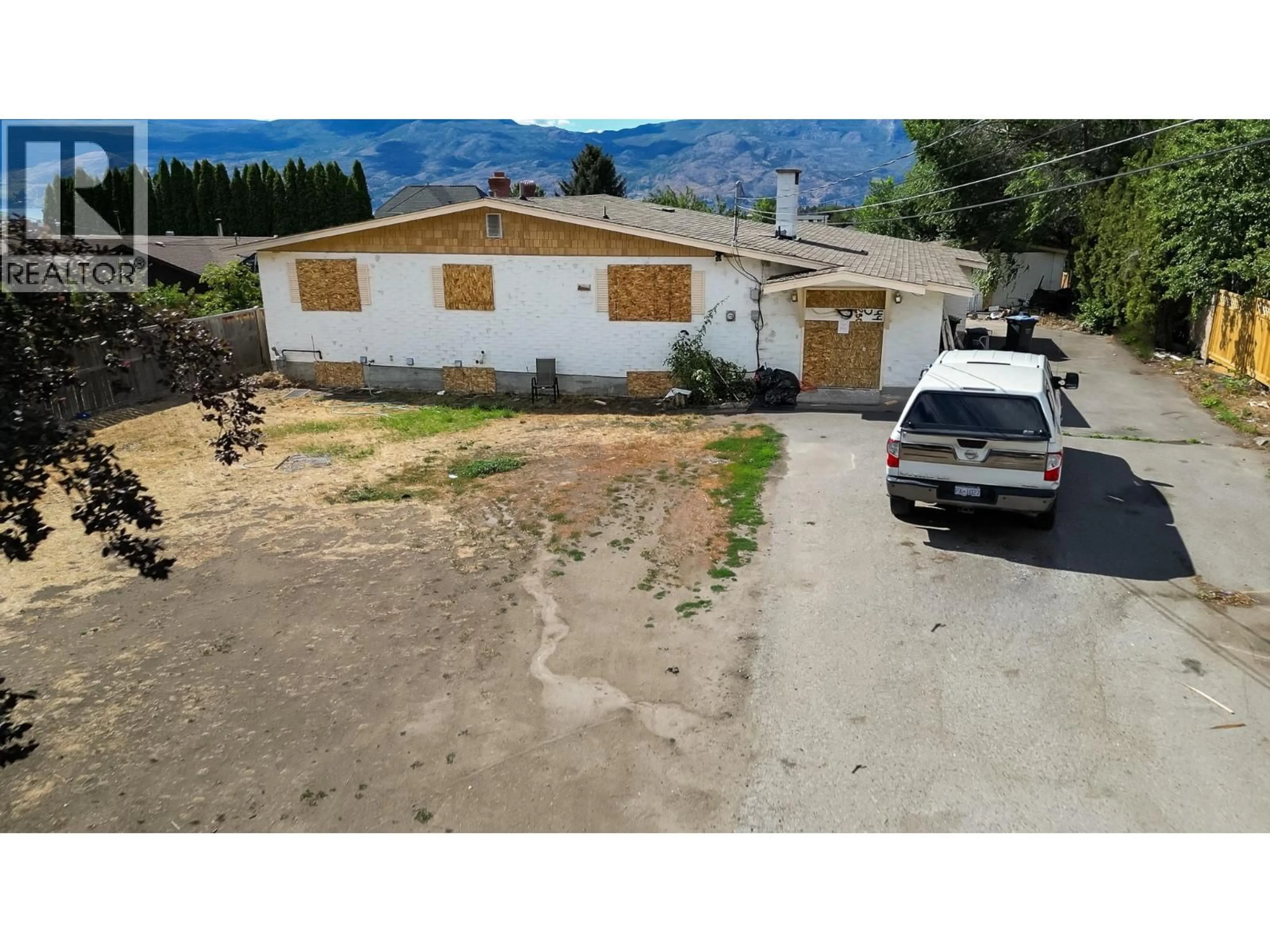 A pic from outside/outdoor area/front of a property/back of a property/a pic from drone, mountain view for 2489 REECE ROAD, West Kelowna British Columbia V4T1N1