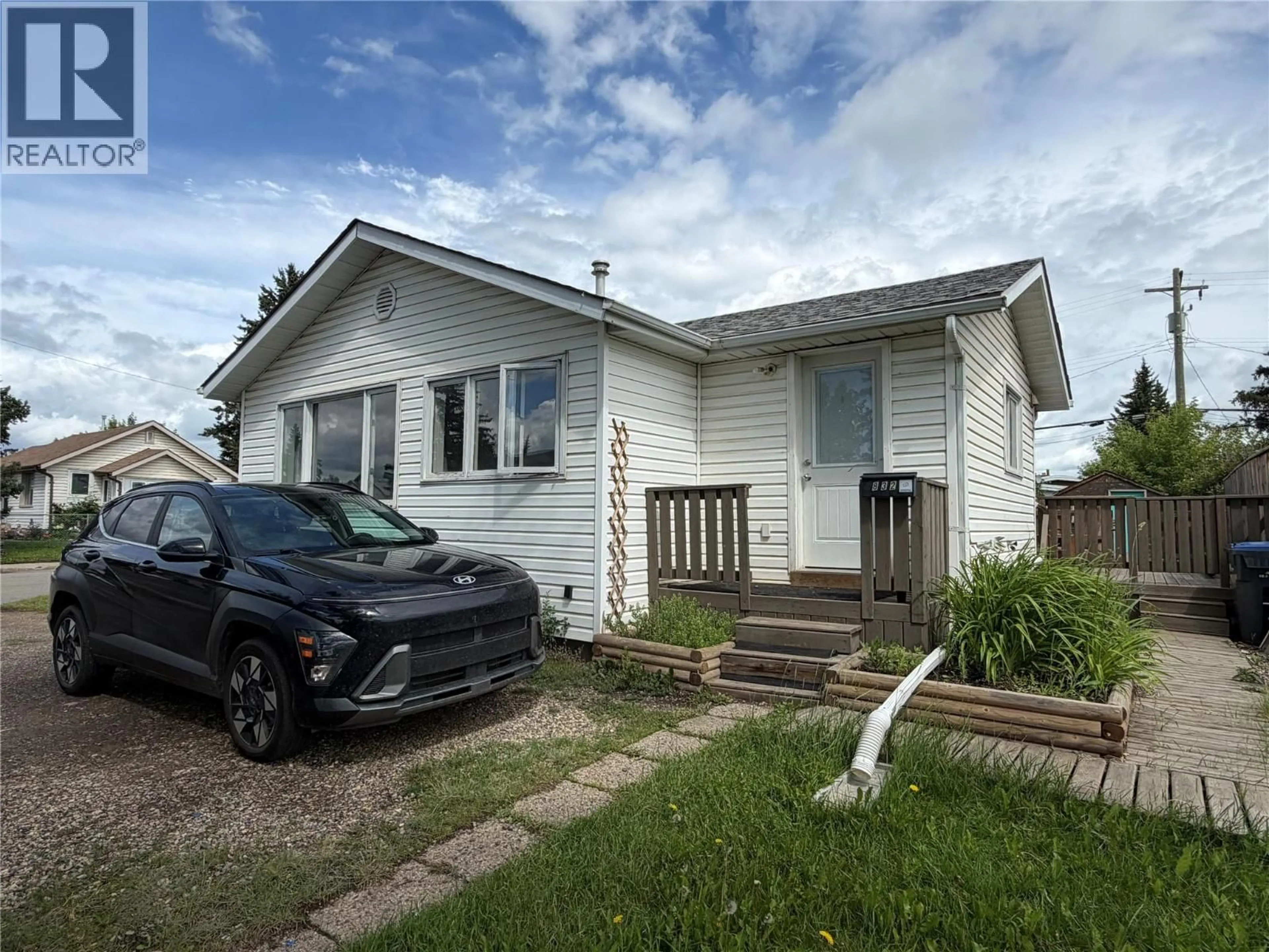 Home with vinyl exterior material, street for 832 106 AVENUE, Dawson Creek British Columbia V1G2N4