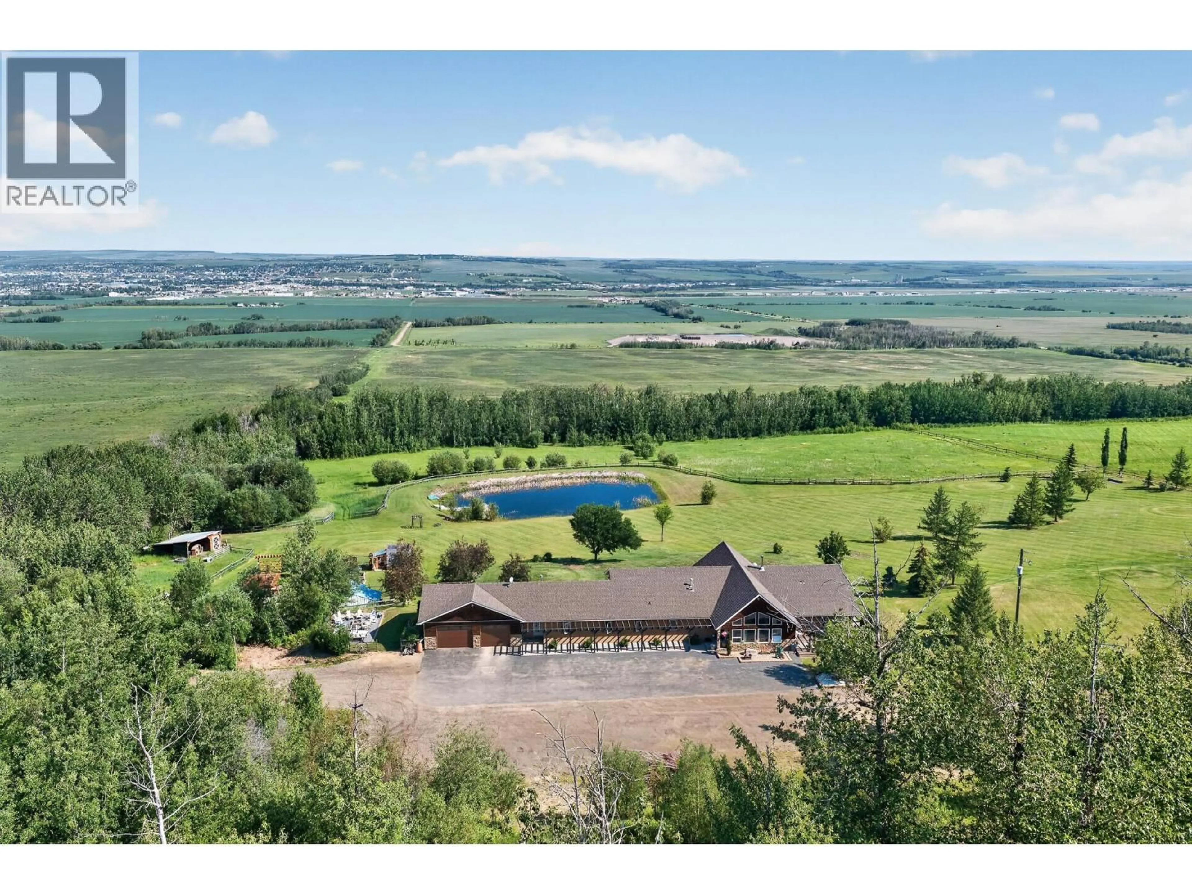 A pic from outside/outdoor area/front of a property/back of a property/a pic from drone, mountain view for 1094 PARADISE VALLEY OTHER, Dawson Creek British Columbia V1G0H4