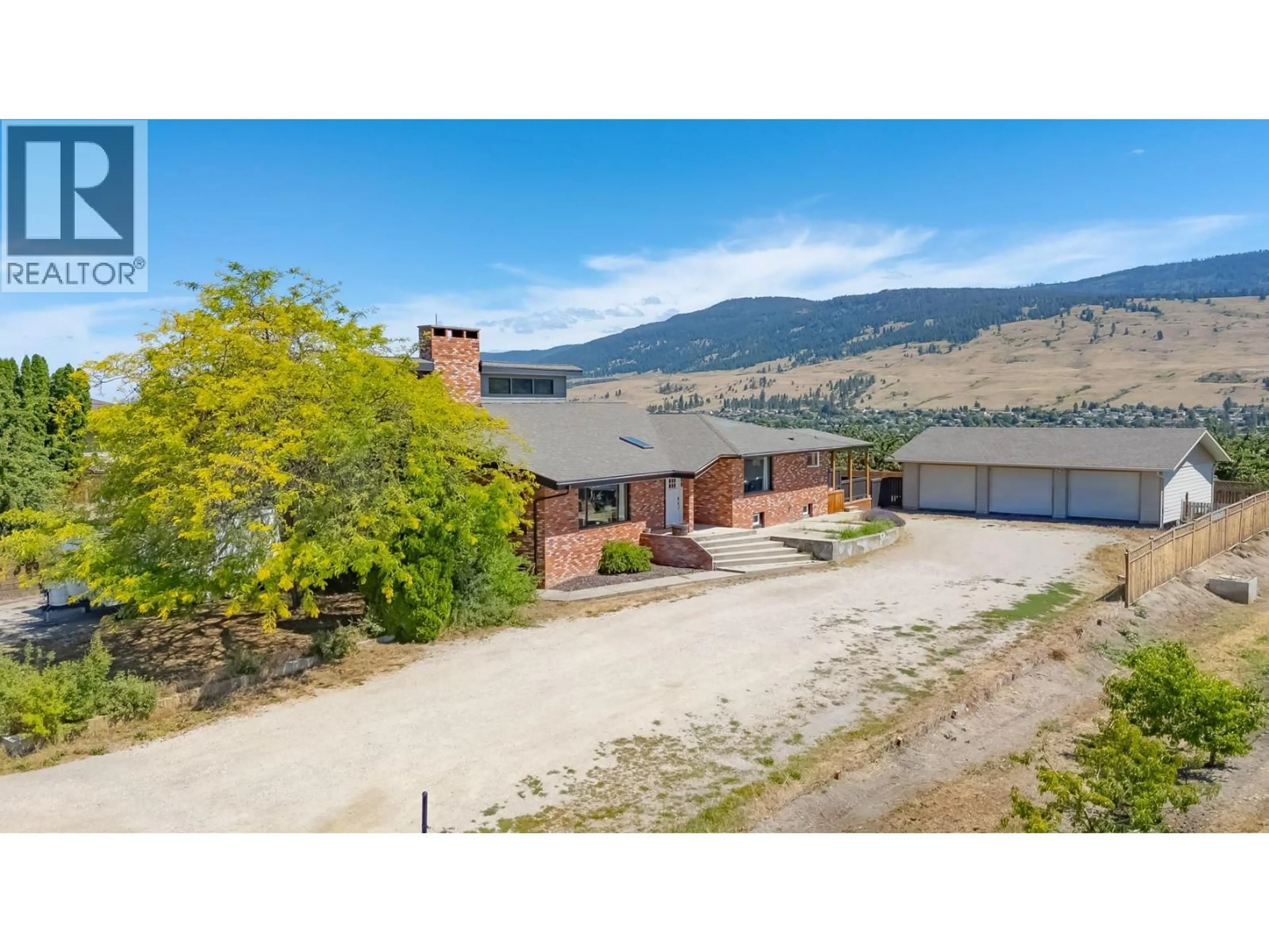 A pic from outside/outdoor area/front of a property/back of a property/a pic from drone, mountain view for 10371 OKANAGAN CENTRE ROAD EAST, Lake Country British Columbia V4V1K9