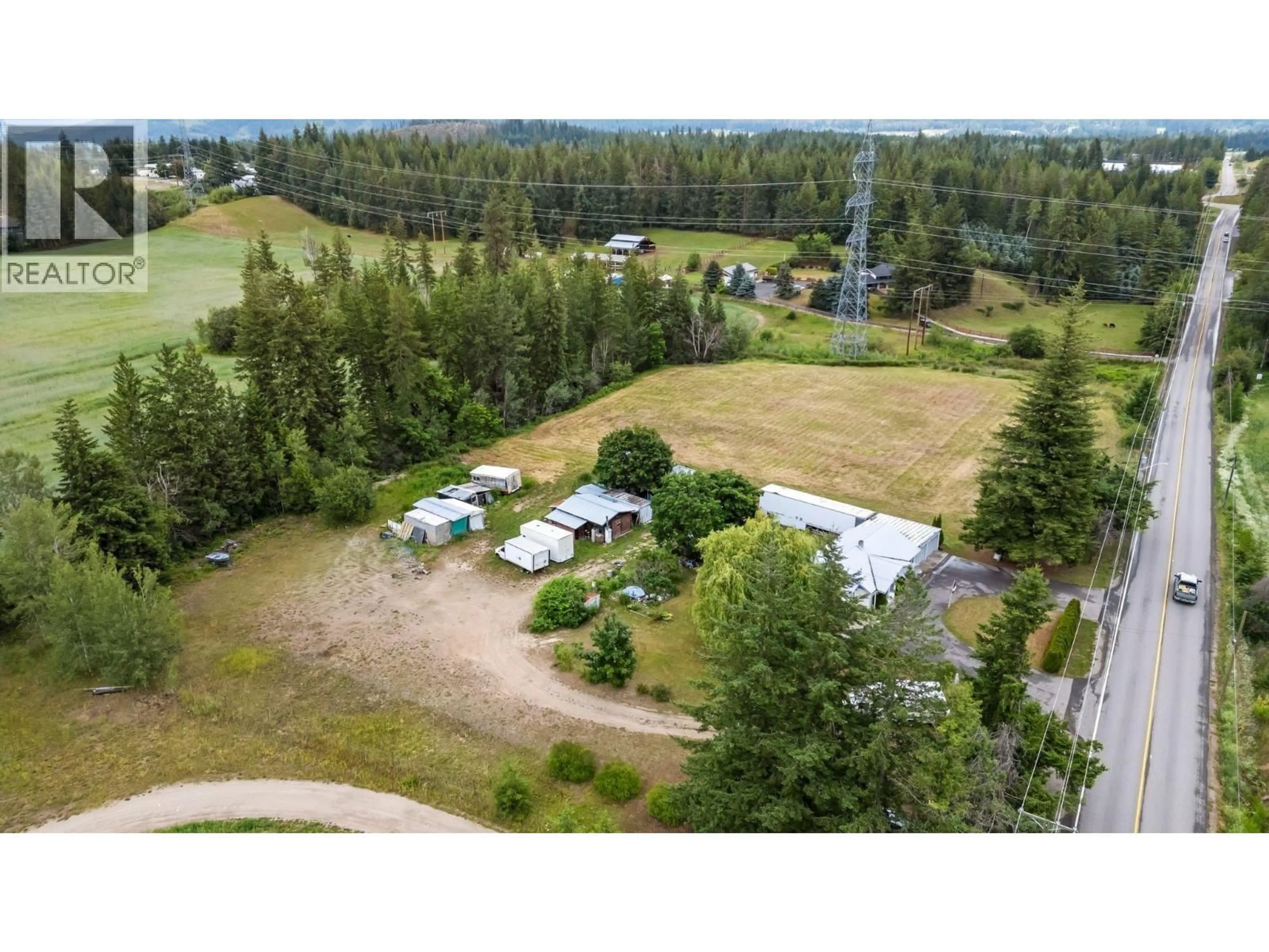 A pic from outside/outdoor area/front of a property/back of a property/a pic from drone, mountain view for 2391 20 AVENUE SOUTHEAST, Salmon Arm British Columbia V1E1L4