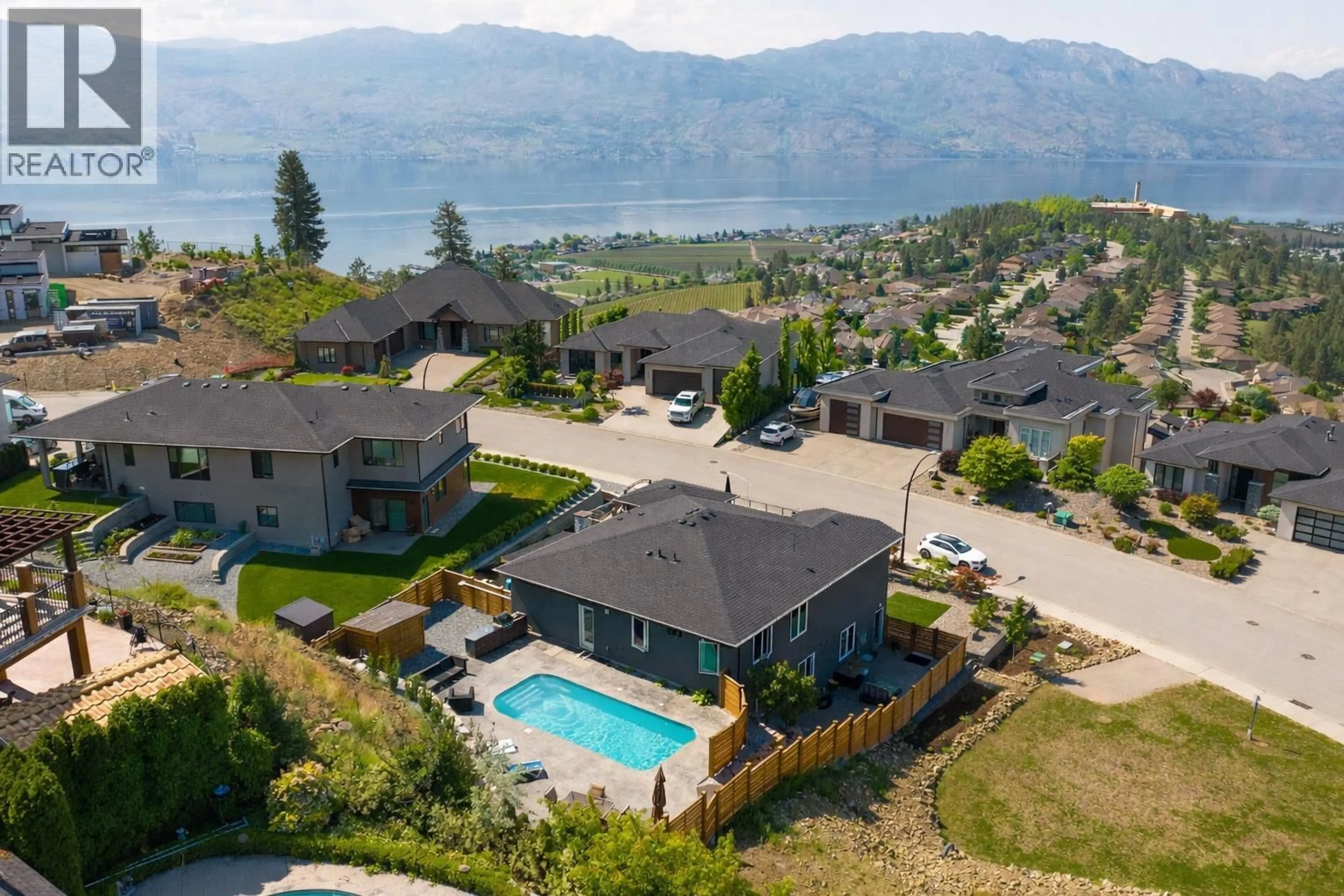 A pic from outside/outdoor area/front of a property/back of a property/a pic from drone, water/lake/river/ocean view for 3284 VINEYARD VIEW DRIVE, West Kelowna British Columbia V4T3B4
