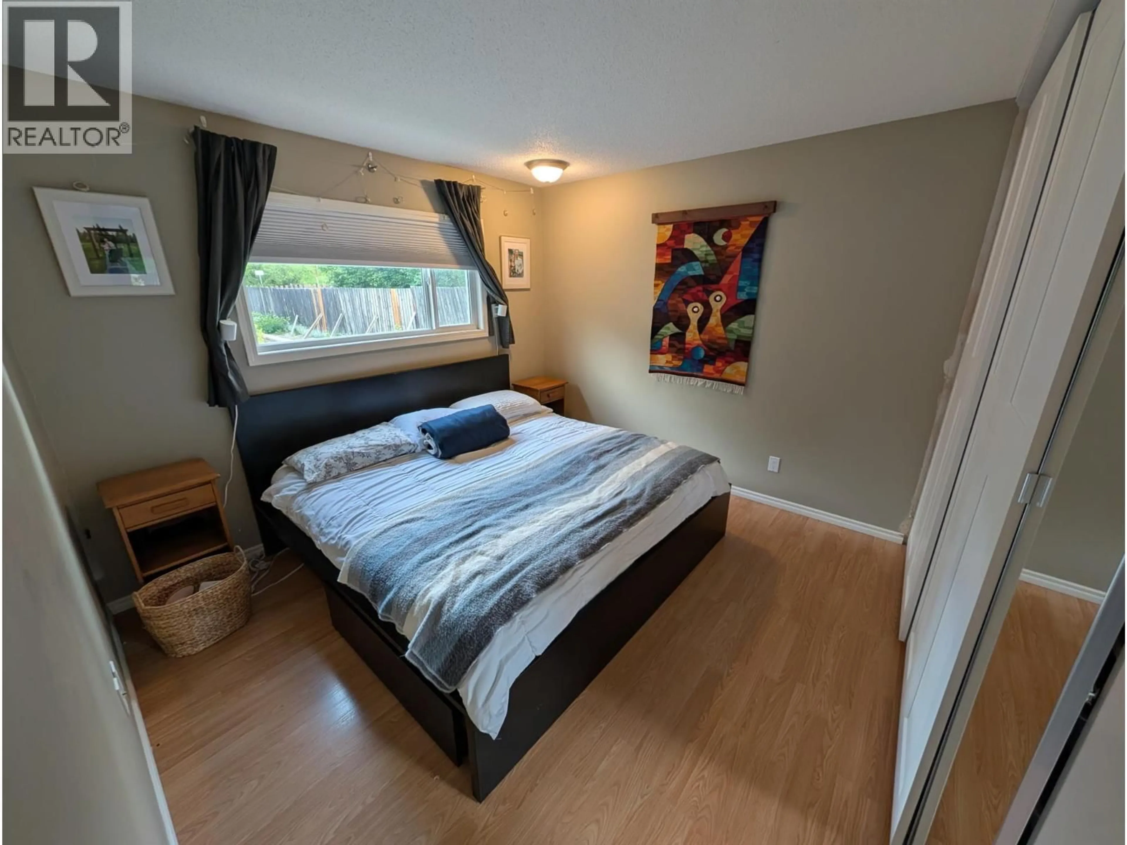 Bedroom with bed, wood/laminate floor for 540 4TH AVENUE, Kimberley British Columbia V1A2R9