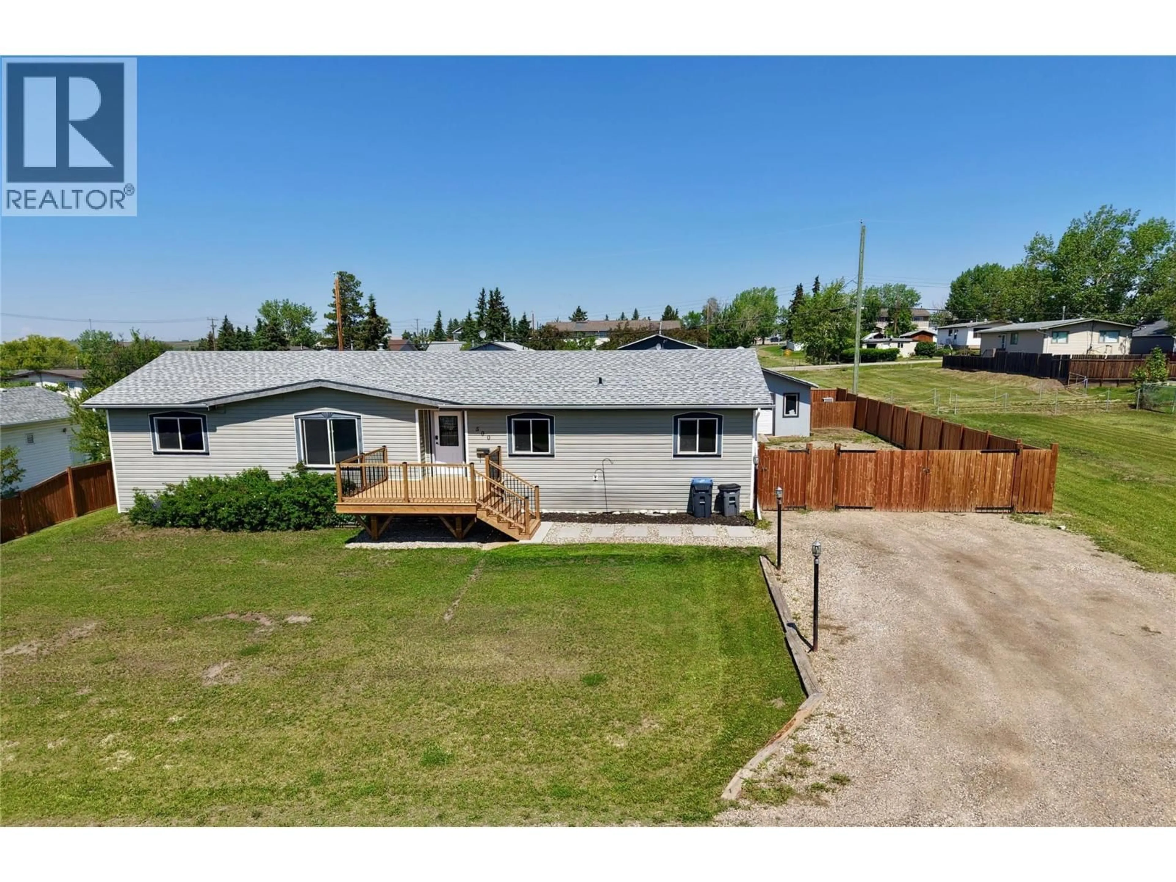 A pic from outside/outdoor area/front of a property/back of a property/a pic from drone, unknown for 500 99 AVENUE, Dawson Creek British Columbia V1G1T3